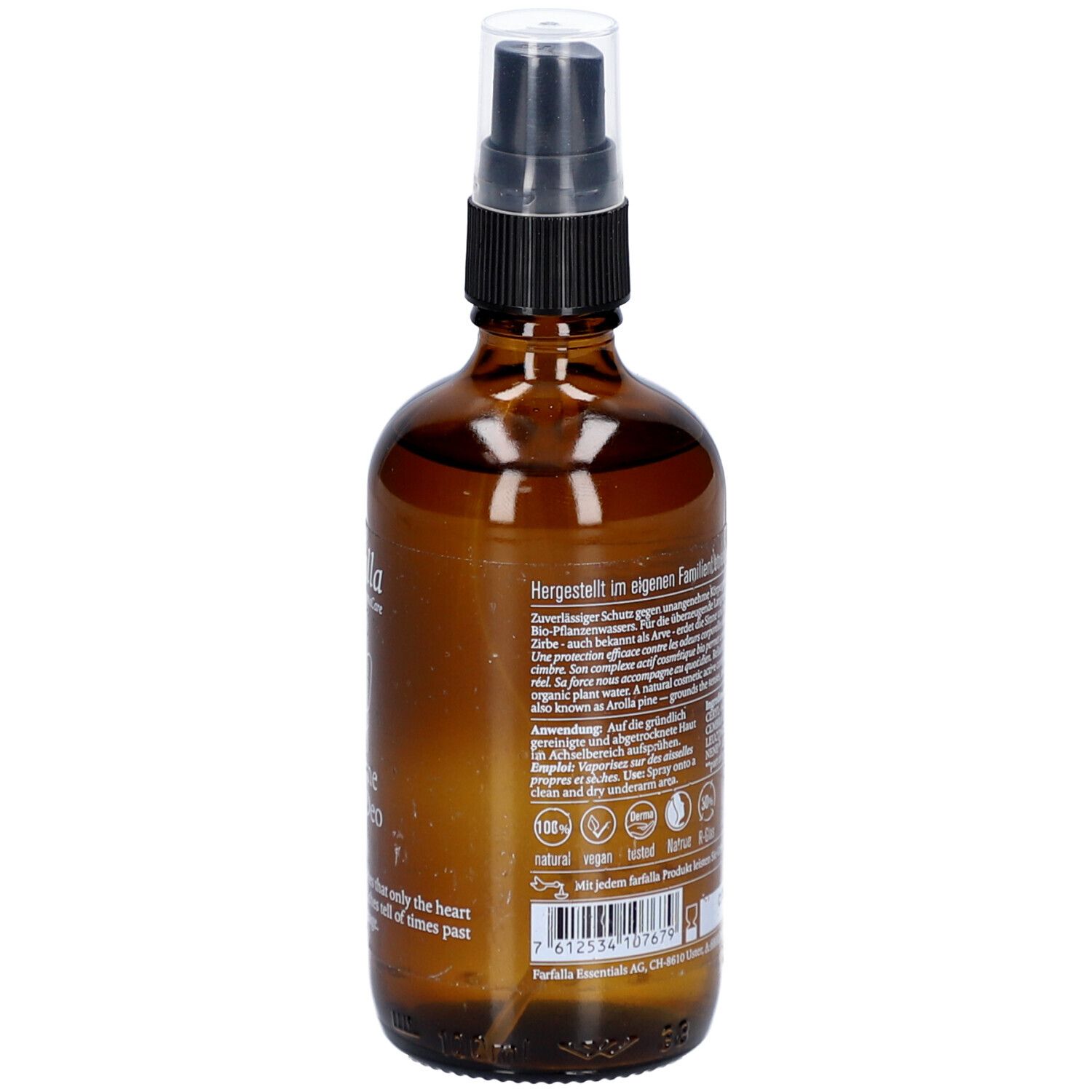 Bruine glazen fles met verstuiver. Achterkant met tekst, ingrediënten en logo's. 100ml.