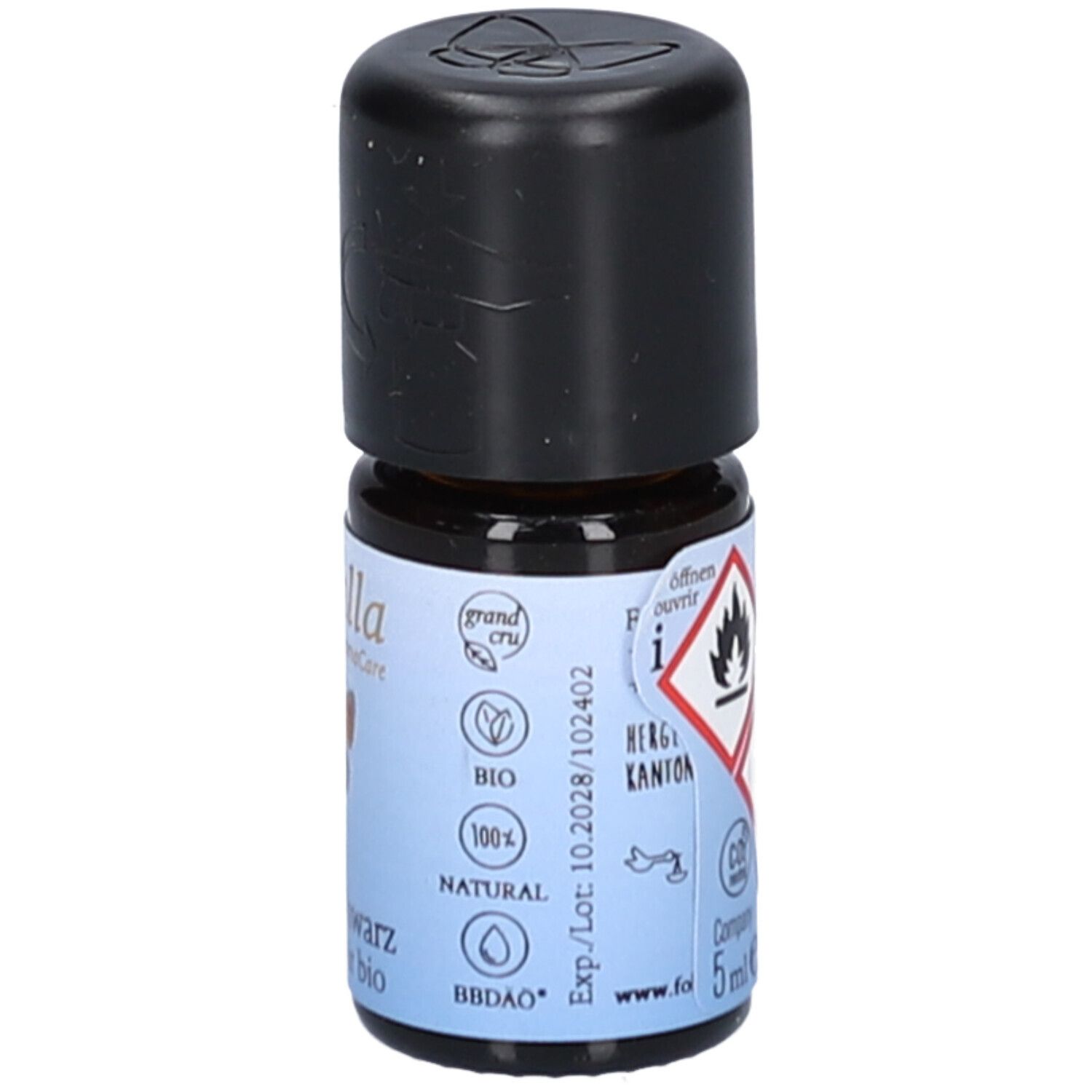 Bouteille en verre brun avec bouchon noir. Autocollant avec symboles d'avertissement, texte: farfalla, Pfeffer schwarz, Poivre noir bio. Volume: 5 ml.