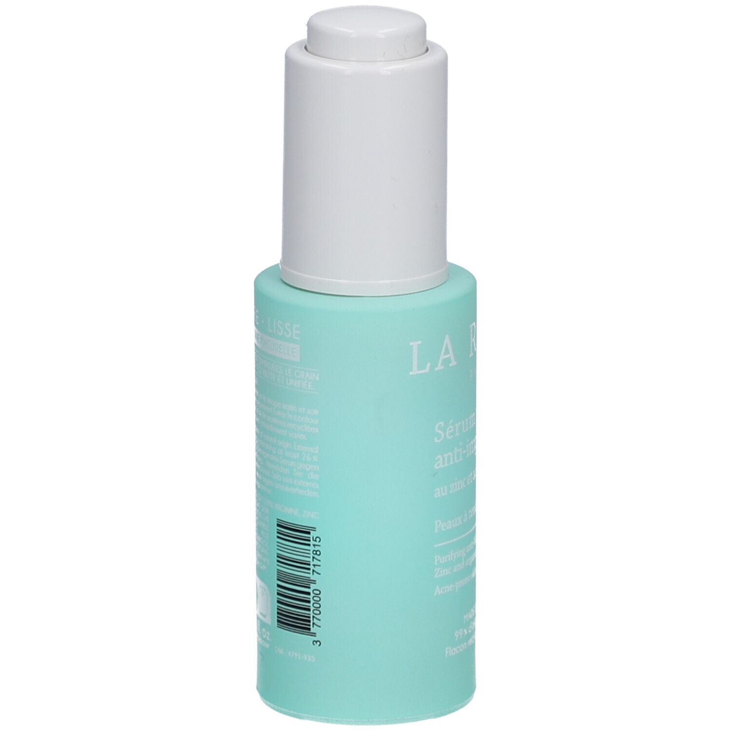 Flacon turquoise avec pompe blanche. Texte et code-barres au dos. Nom du produit: La Rosée Paris, Sérum purifiant anti-imperfections.