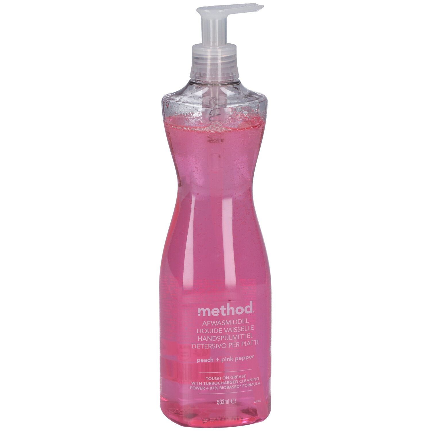 Fles roze afwasmiddel, transparante dispenser. Opschrift: method, Peach + Pink Pepper.