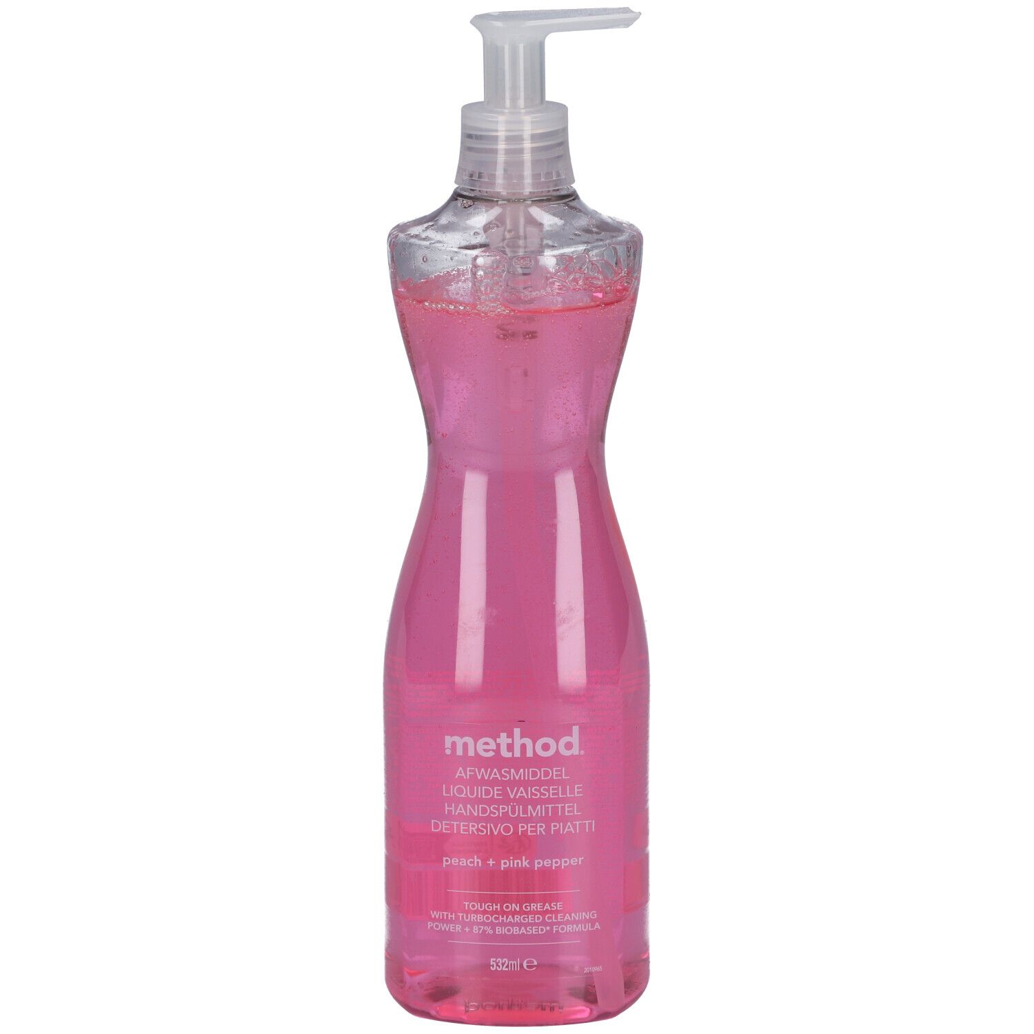 Fles roze afwasmiddel, transparante dispenser. Opschrift: method, Peach + Pink Pepper.