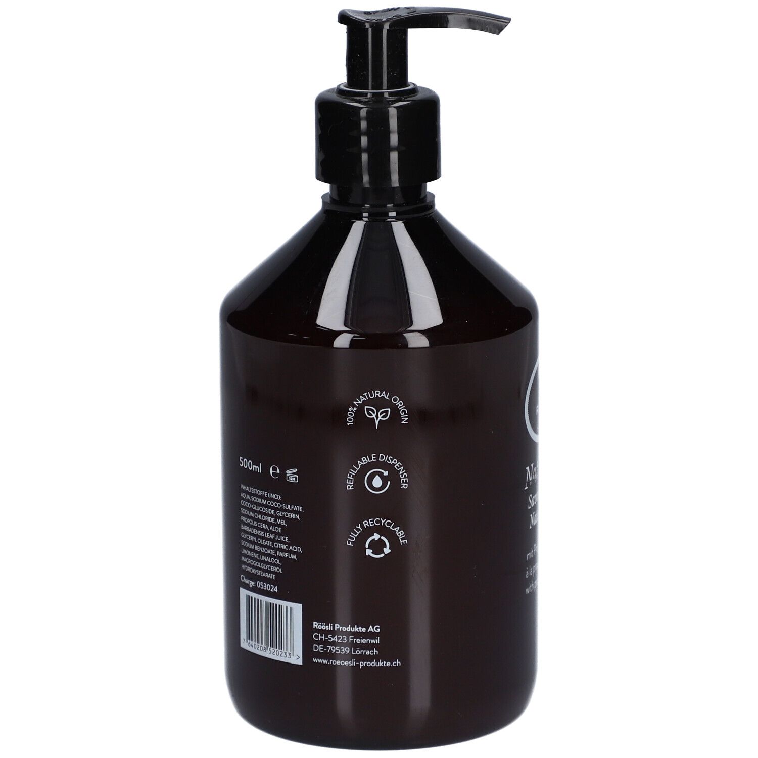 Achterkant bruine fles met zwarte pomp. Tekst: 100% natuurlijke oorsprong, navulbaar, recyclebaar. Ingrediënten en fabrikant.