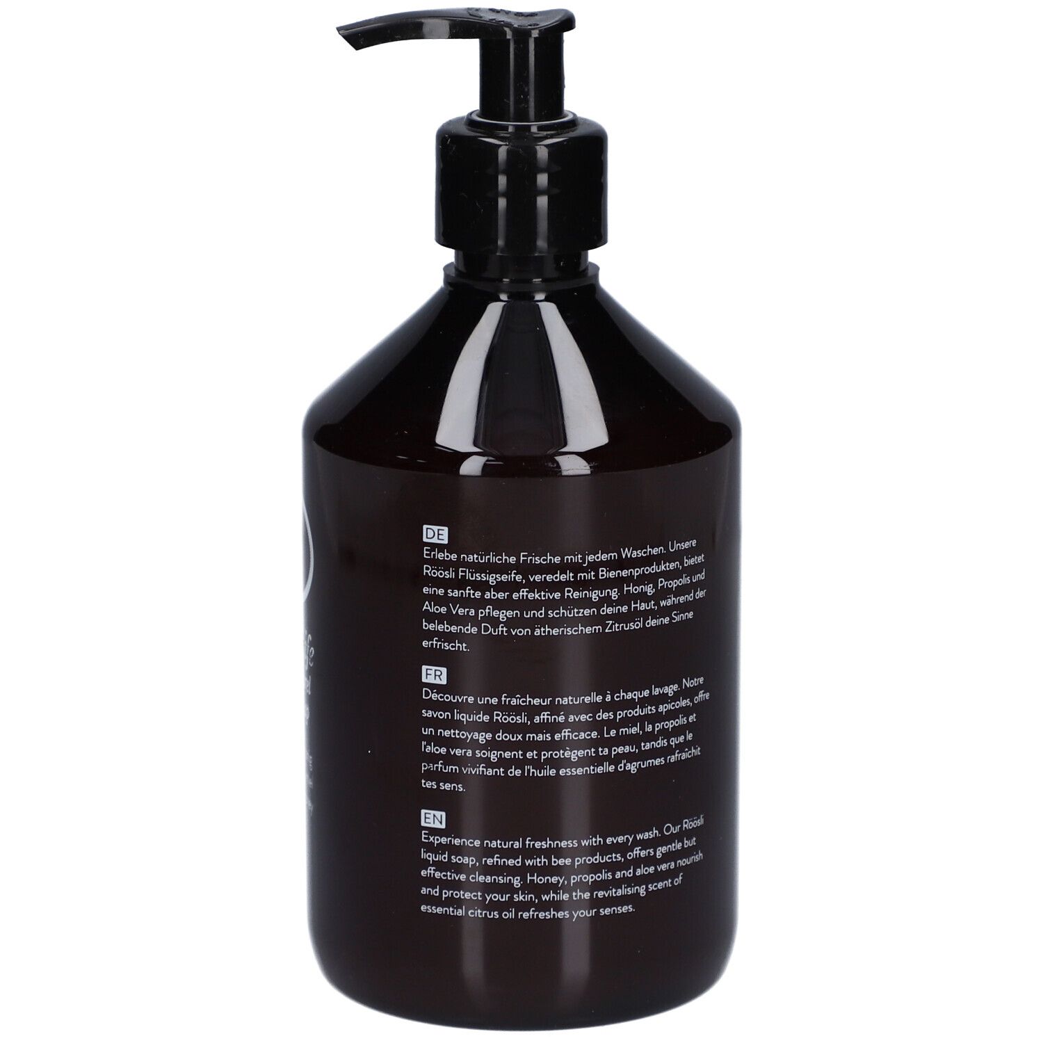 Achterkant bruine fles met zwarte pomp. Tekst in het Duits, Frans en Engels. Productbeschrijving en ingrediënten.