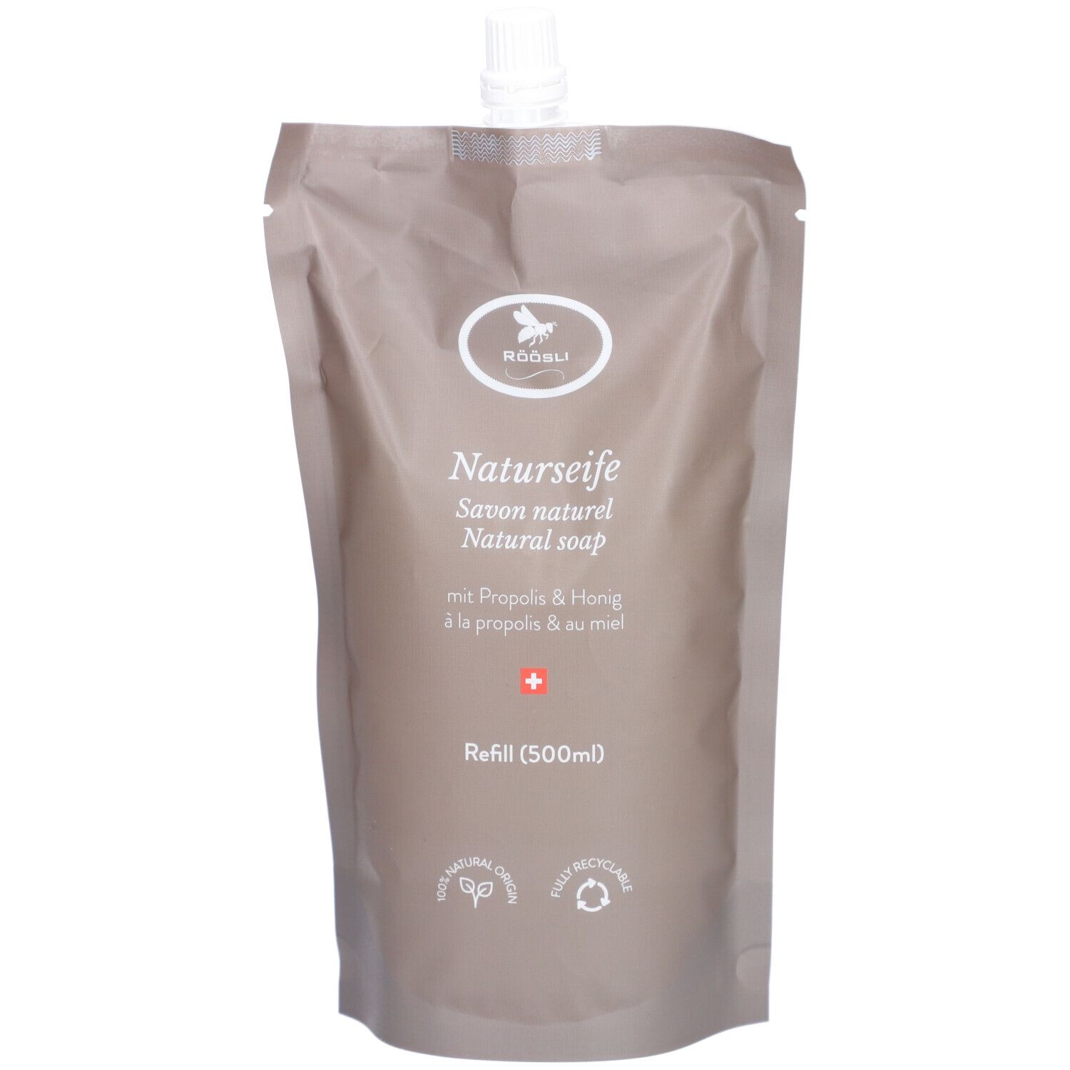 Navulverpakking natuurlijke zeep met schroefdop. Beige verpakking met productnaam en logo. Bevat propolis en honing.