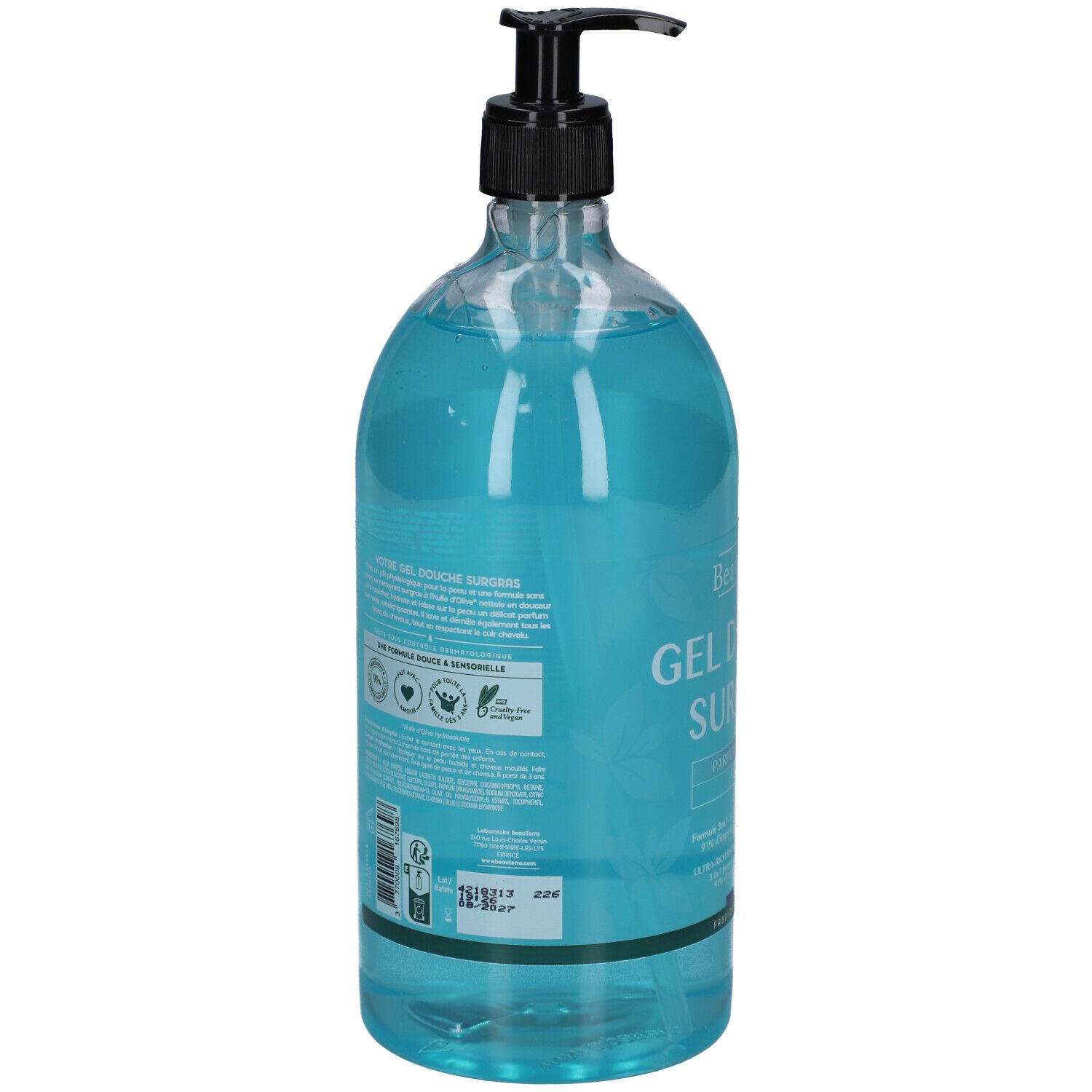 Dos du flacon transparent de gel douche bleu. Distributeur noir. Texte et logos.