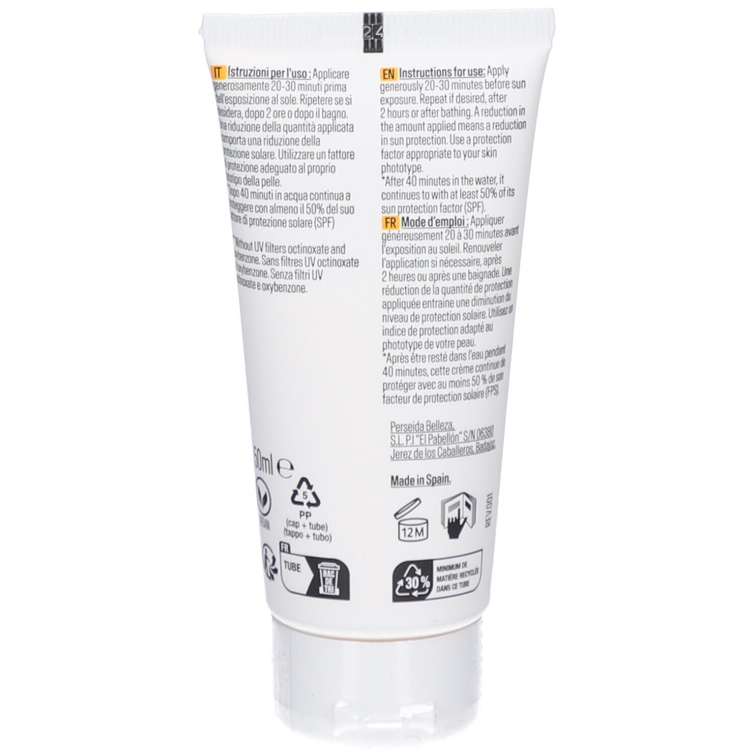 Dos du tube blanc. Texte multilingue. Instructions d'utilisation, ingrédients et fabricant. Symboles de recyclage.