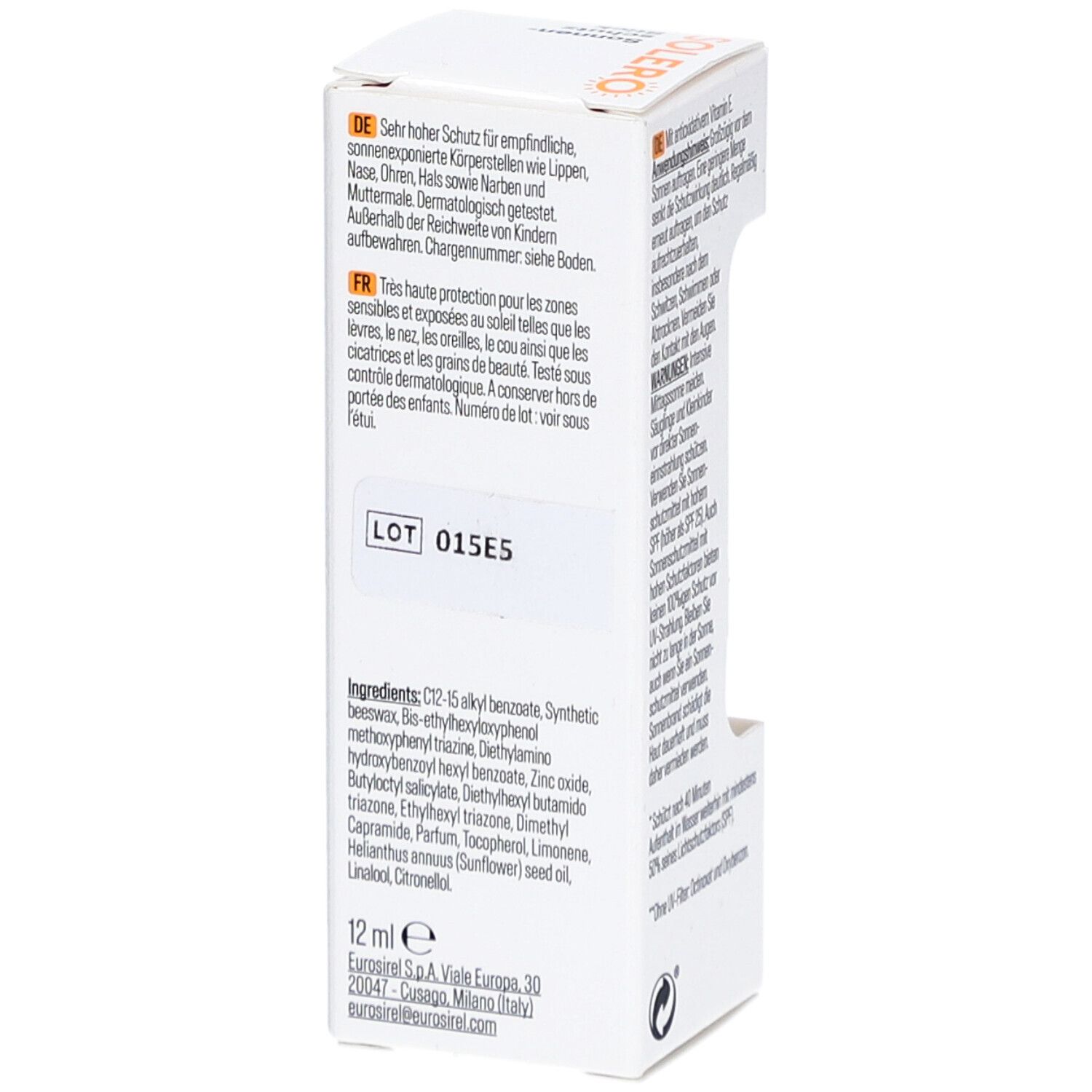 Verpakking van SOLERO zonnebrandstift. Bevat informatie over ingrediënten en gebruik. Tekst: 12 ml. Lotnummer: 015E5.