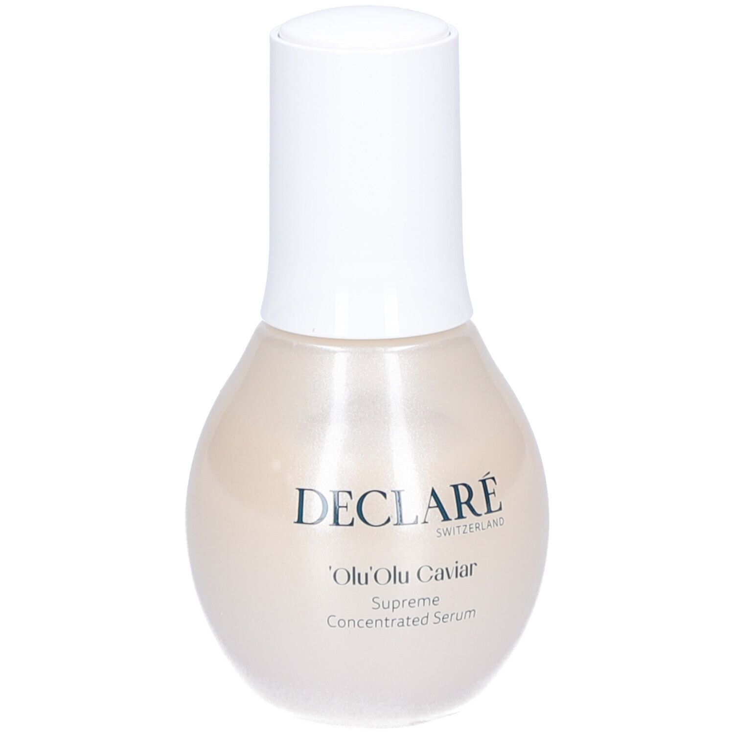 Flacon de sérum avec bouchon blanc. Inscription: DECLARÉ, 'Olu 'Olu Caviar, Supreme Concentrated Serum.