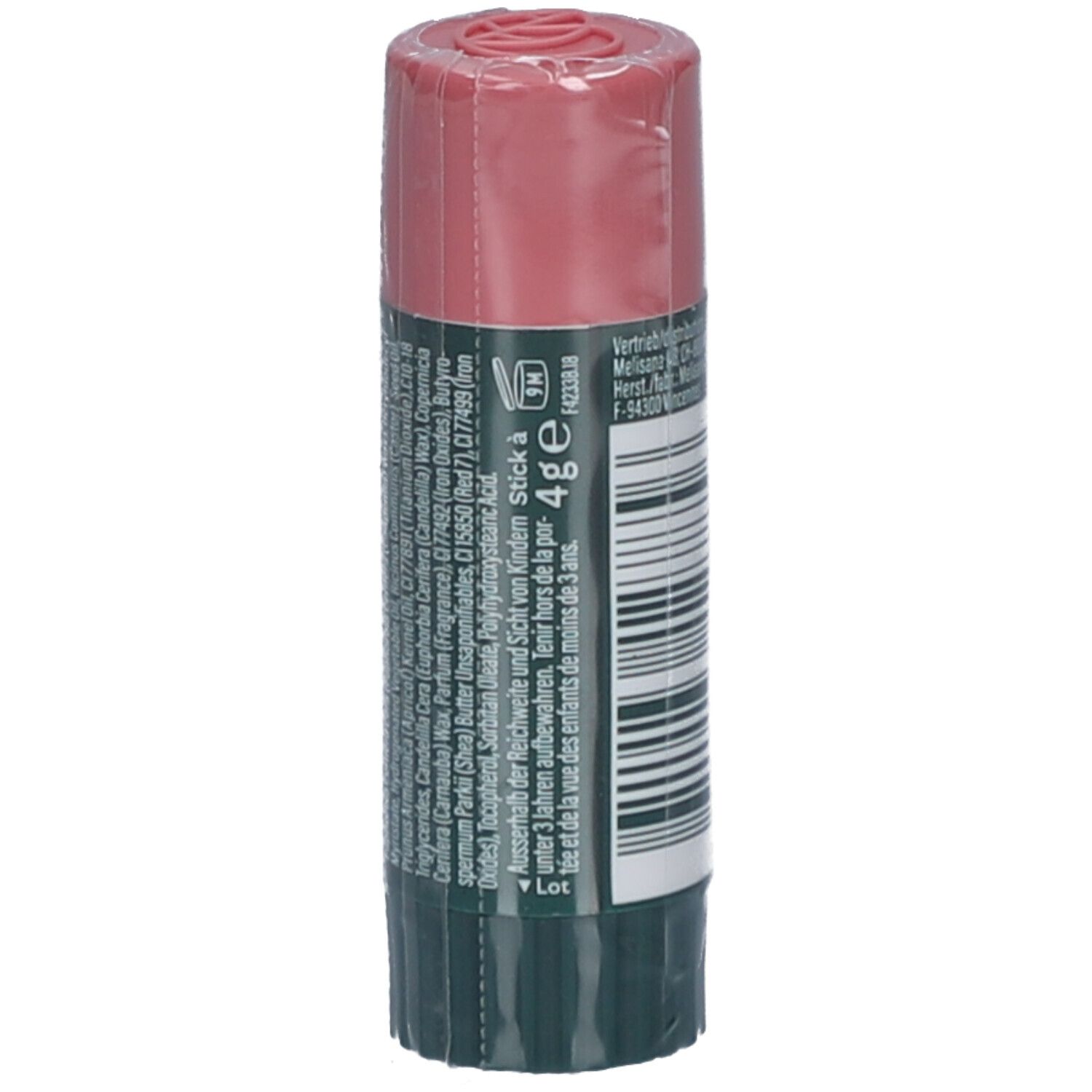 Stick à lèvres avec capuchon rose et étiquette verte. Verso avec texte, ingrédients et avertissement.