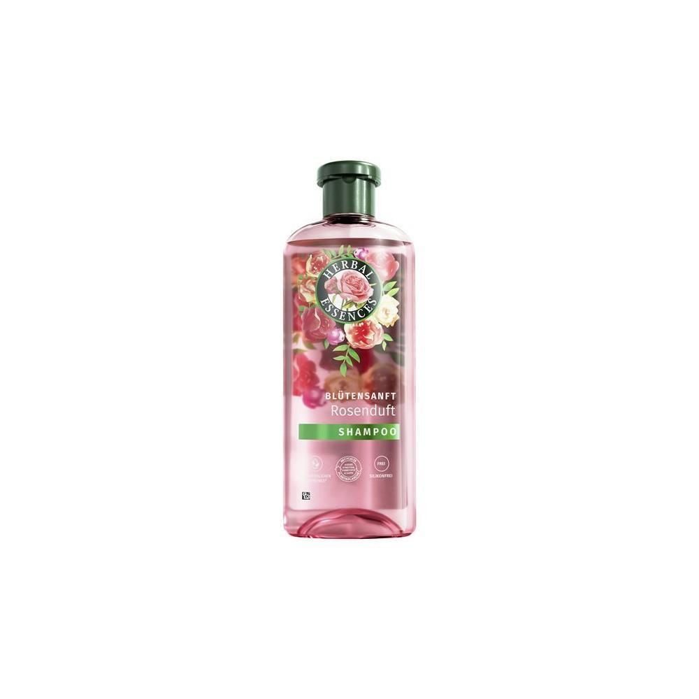 Shampoo rose en flacon avec bouchon vert. Étiquette avec motif floral et texte 'Blütensanft Rosenduft Shampoo'.