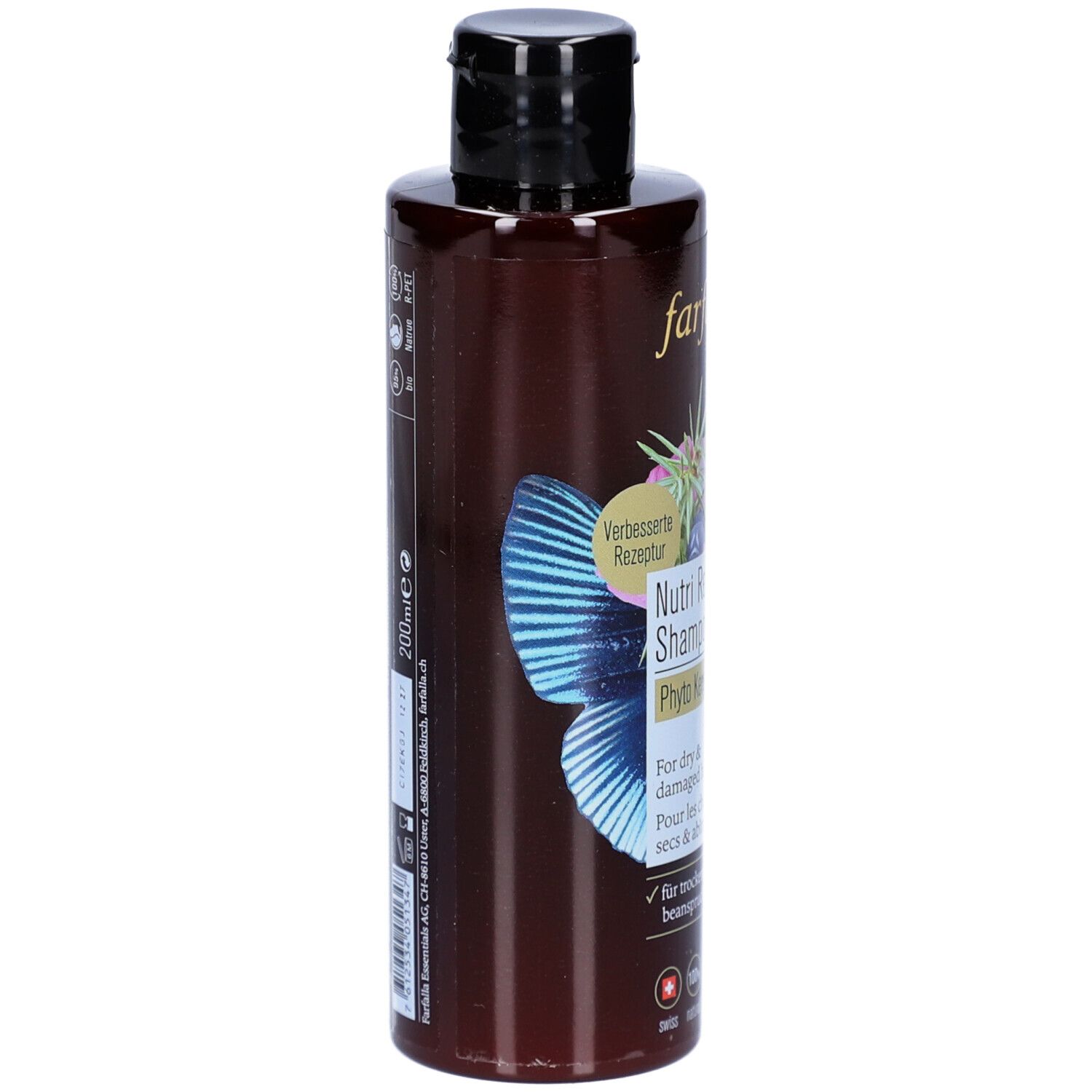 Flacon de shampooing brun, vue latérale. Inscription : Nutri Repair Shampoo, Phyto Keratin. Pour cheveux secs et abîmés. 200ml.