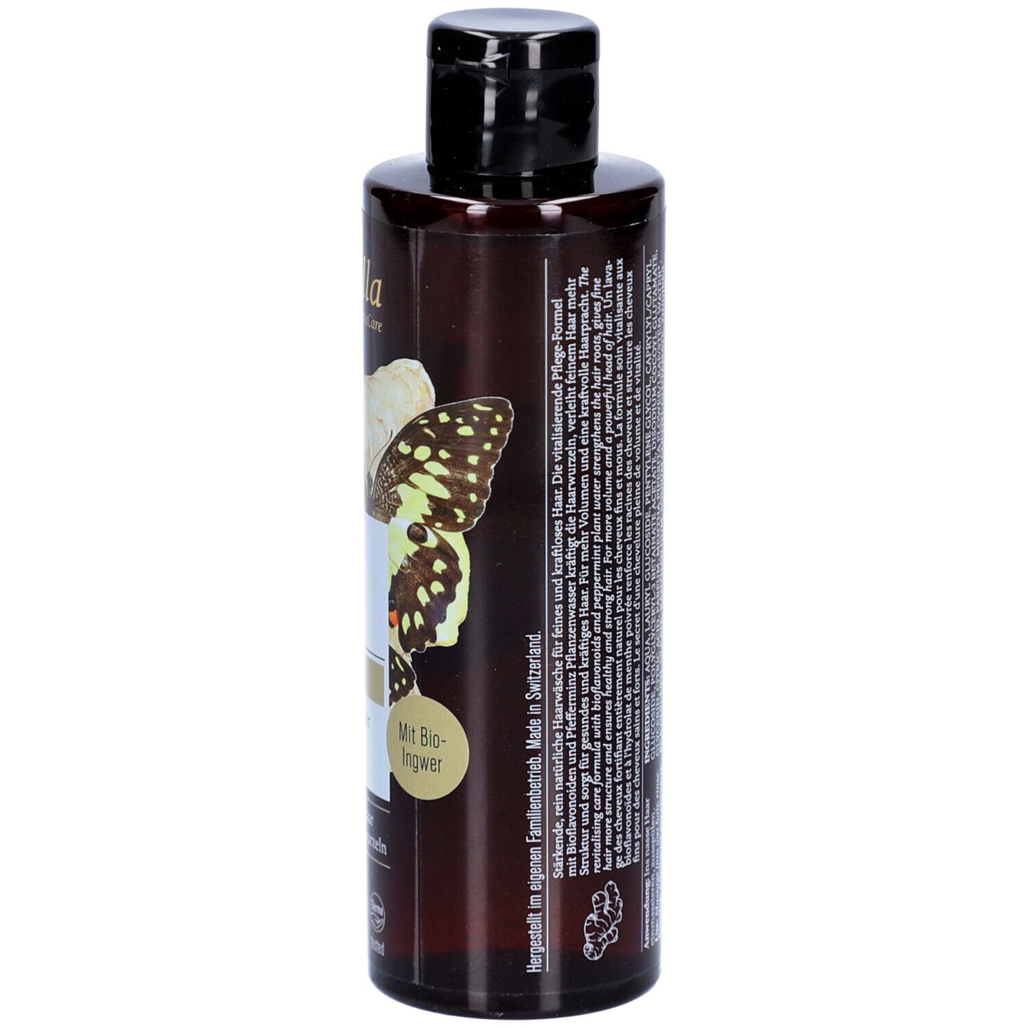 Dos d'un flacon de shampooing brun avec bouchon noir. Texte : informations fabricant, ingrédients, logos.