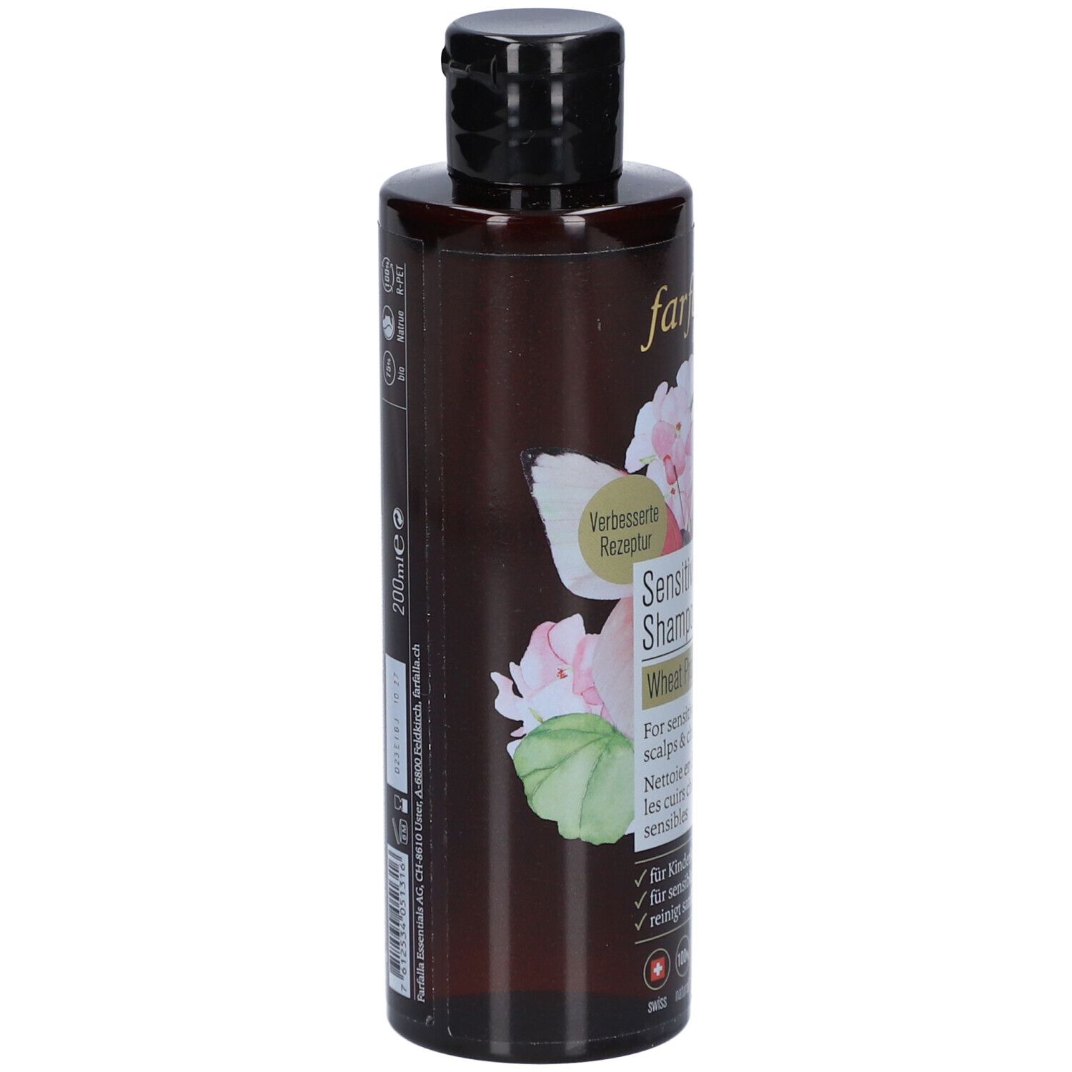 Bruine fles Farfalla shampoo. Opschrift: Sensitive Shampoo, tarweproteïne. Zijkant: 200ml, ingrediënten, fabrikant informatie.