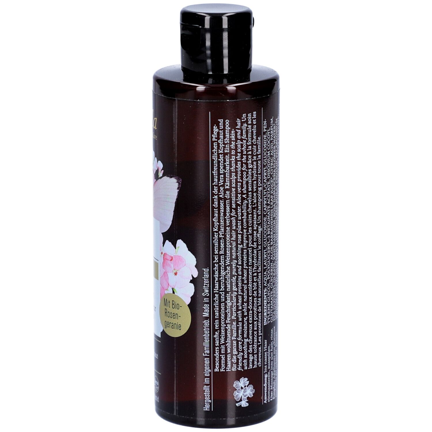 Achterkant van de bruine Farfalla shampoo fles. Tekst: ingrediënten, fabrikant informatie, 200ml. Logo's: Vegan, Swiss, Natural, getest.