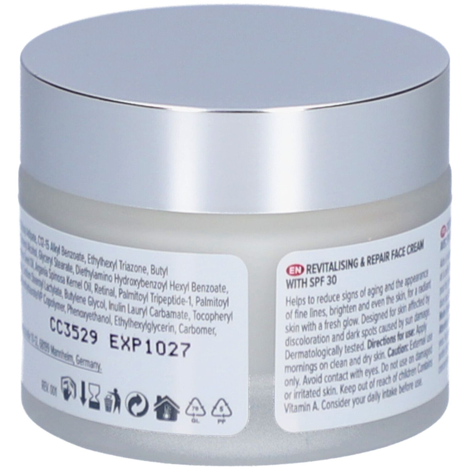 Achterkant van de crèmepot met ingrediënten en tekst. Opschrift: Revitaliserende & Herstellende Gezichtscrème met SPF 30.