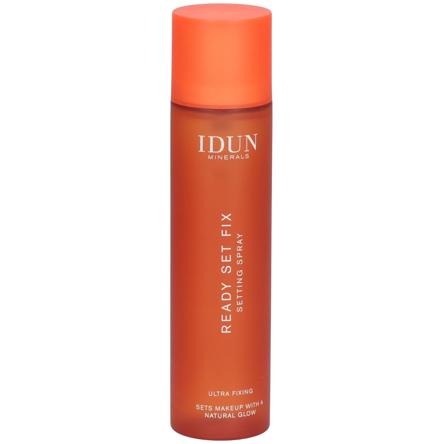 Oranje spuitfles. Opschrift: IDUN Minerals, READY SET FIX, SETTING SPRAY. Ultra Fixing. Sets Makeup with a Natural Glow.