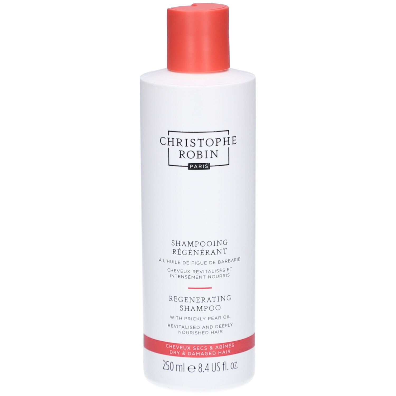 Flacon blanc, bouchon rouge. Inscription: Christophe Robin Paris, Shampooing Régénérant à l'huile de figue de Barbarie. Cheveux secs et abîmés.