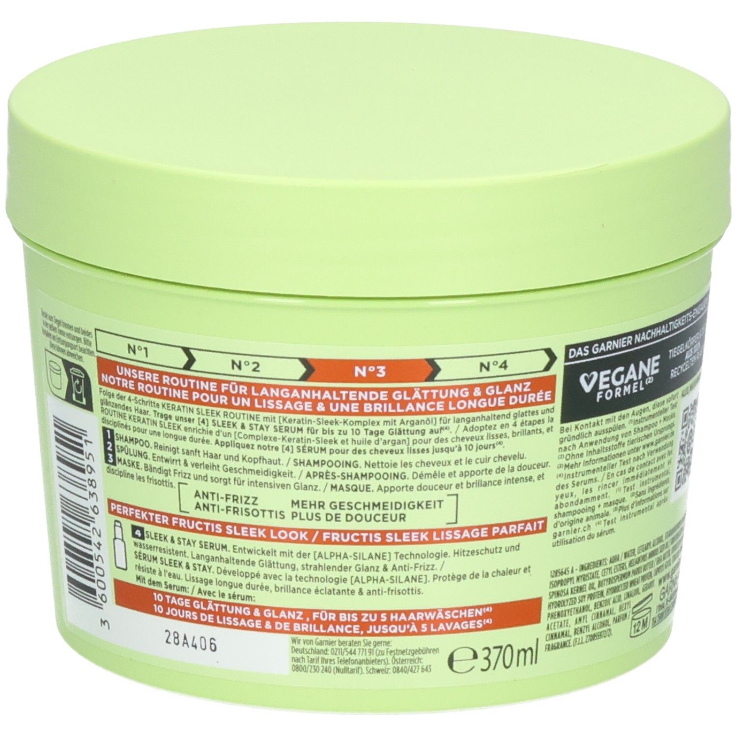 Groene container met haarverzorgingsproduct. Bevat informatie over een routine voor glad haar en glans.