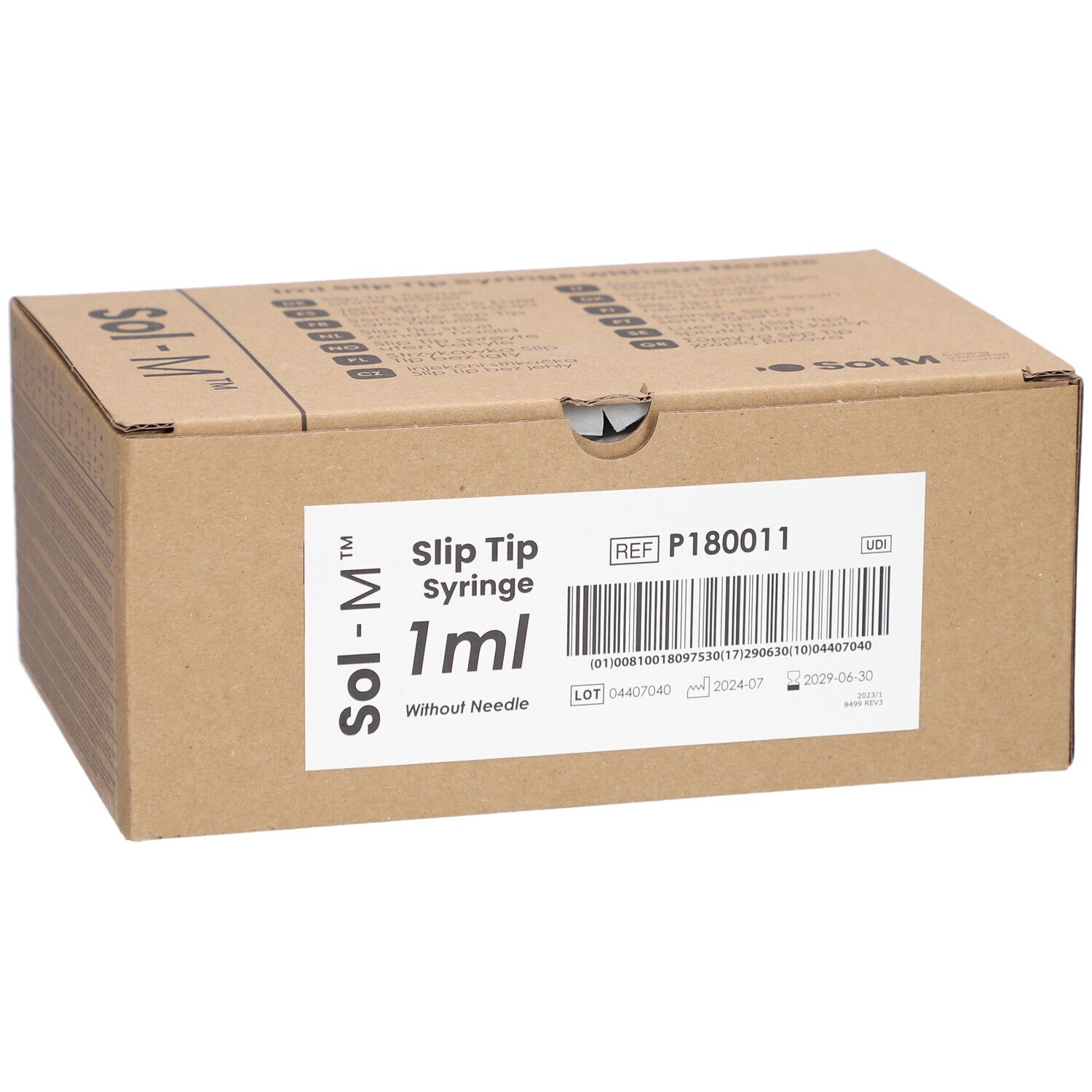 Emballage en carton pour seringues Sol-M. Inscription: Slip Tip Syringe 1ml sans aiguille. Informations produit et code-barres.