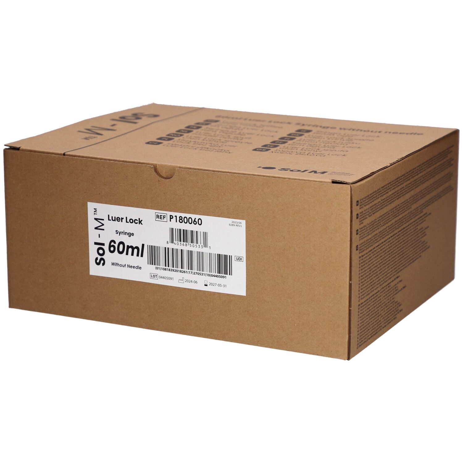 Kartonnen verpakking met productinformatie. Opschrift: Sol-M, Luer Lock, 60ml, zonder naald. Barcode en referentienummer.