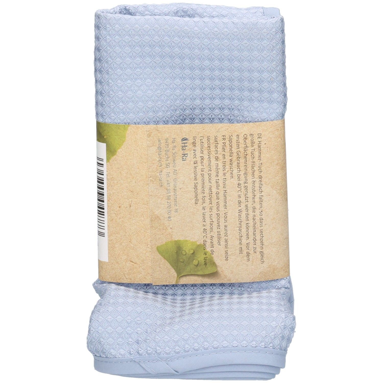 Gerolde blauwe Hammer-doek met papieren banderol. Opdruk: Ha-Ra Professional, productnaam, tekst en logo.