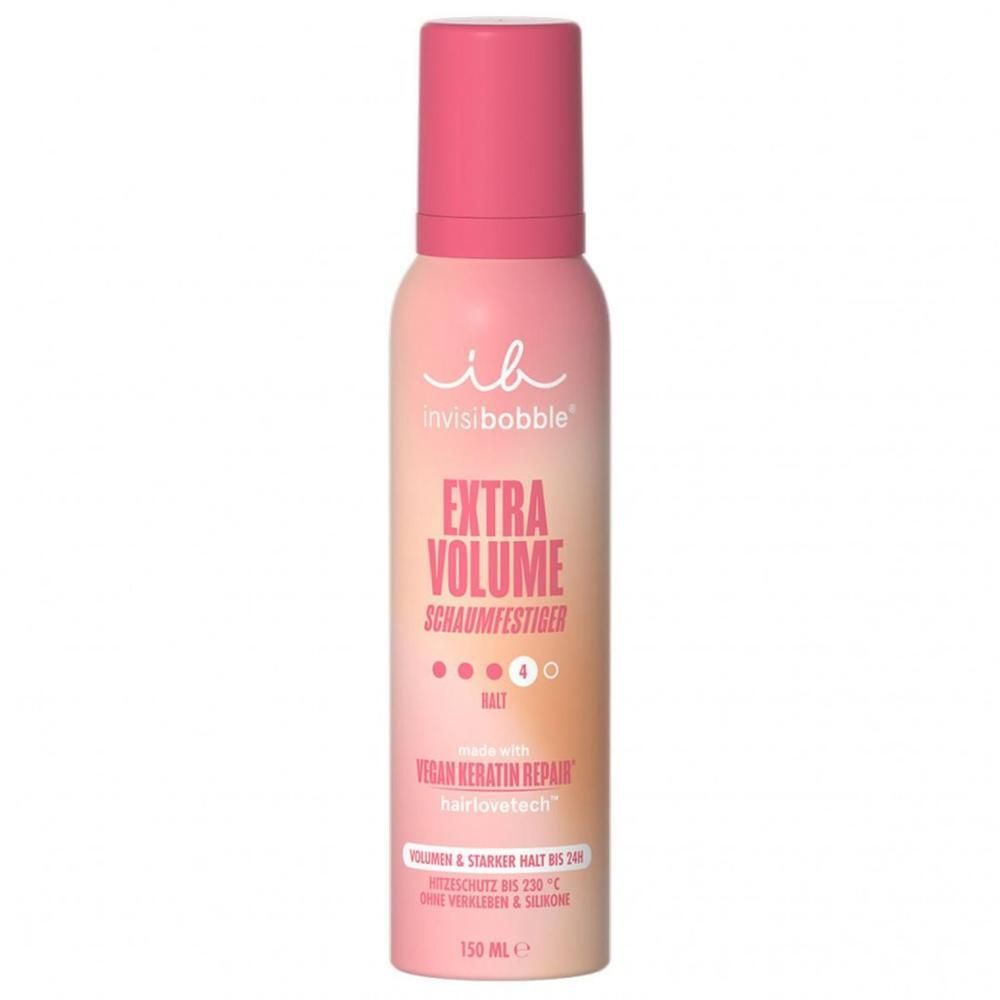 Roze spuitfles met roze dop. Opschrift: Extra Volume Schaumfestiger. Merk: invisibobble.