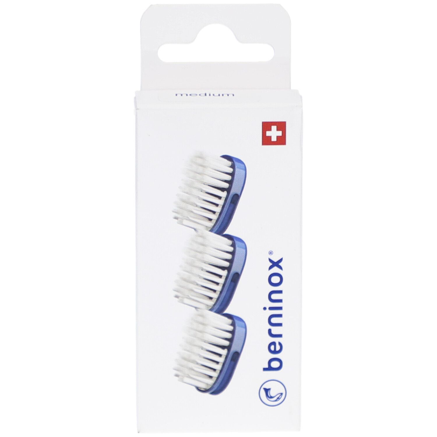 Emballage de 3 têtes de brosse à dents. Support bleu, poils blancs. Marque Berninox, croix suisse.