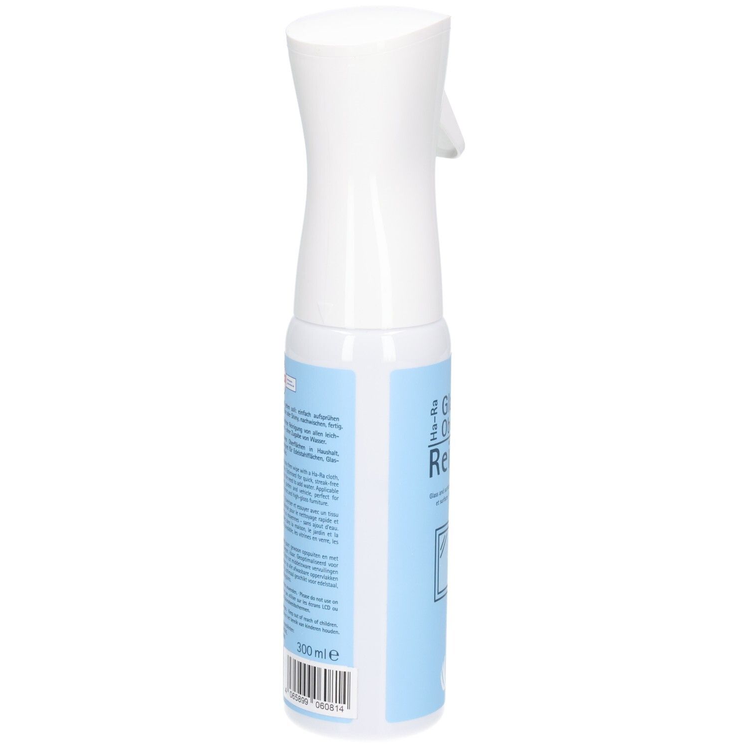 Witte spuitfles met blauw etiket. Tekst en barcode op het etiket. Achteraanzicht.