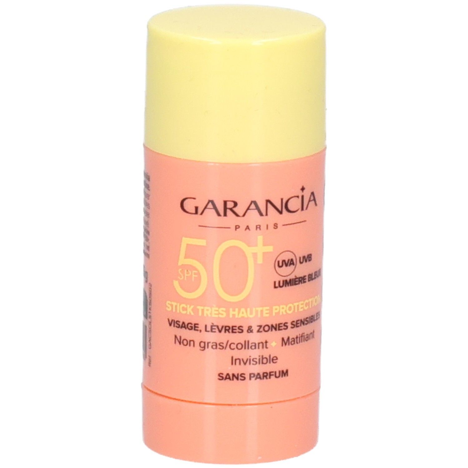 Zonnestick met gele dop en roze houder. Tekst: GARANCIA, SPF 50+, STICK TRES HAUTE PROTECTION, visage, lèvres.