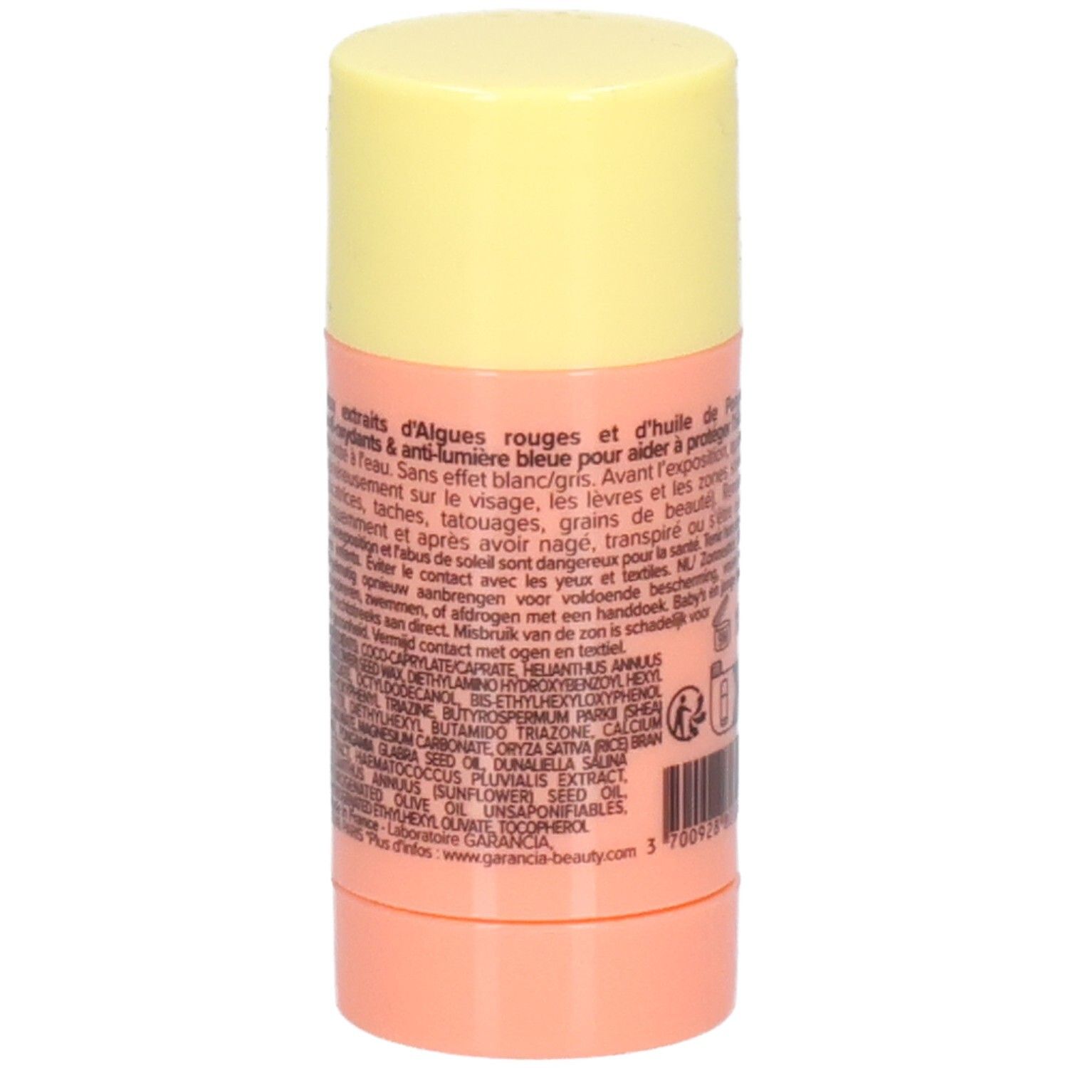 Zonnestick met gele dop en roze houder. Tekst: ingrediënten, gebruiksaanwijzing, GARANCIA-beauty.com.