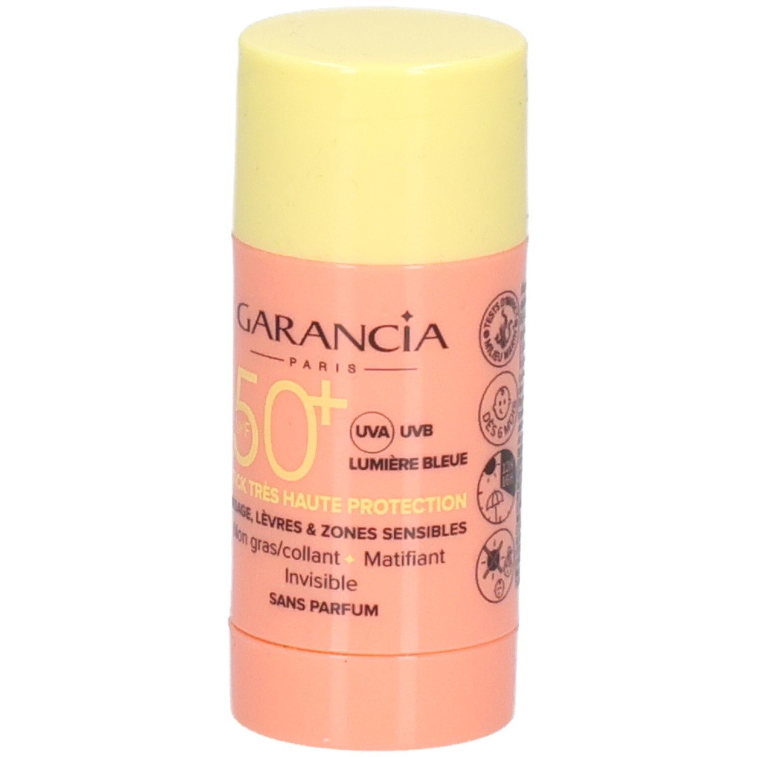 Zonnestick met gele dop en roze houder. Tekst: GARANCIA, SPF 50+, STICK TRES HAUTE PROTECTION, visage, lèvres.