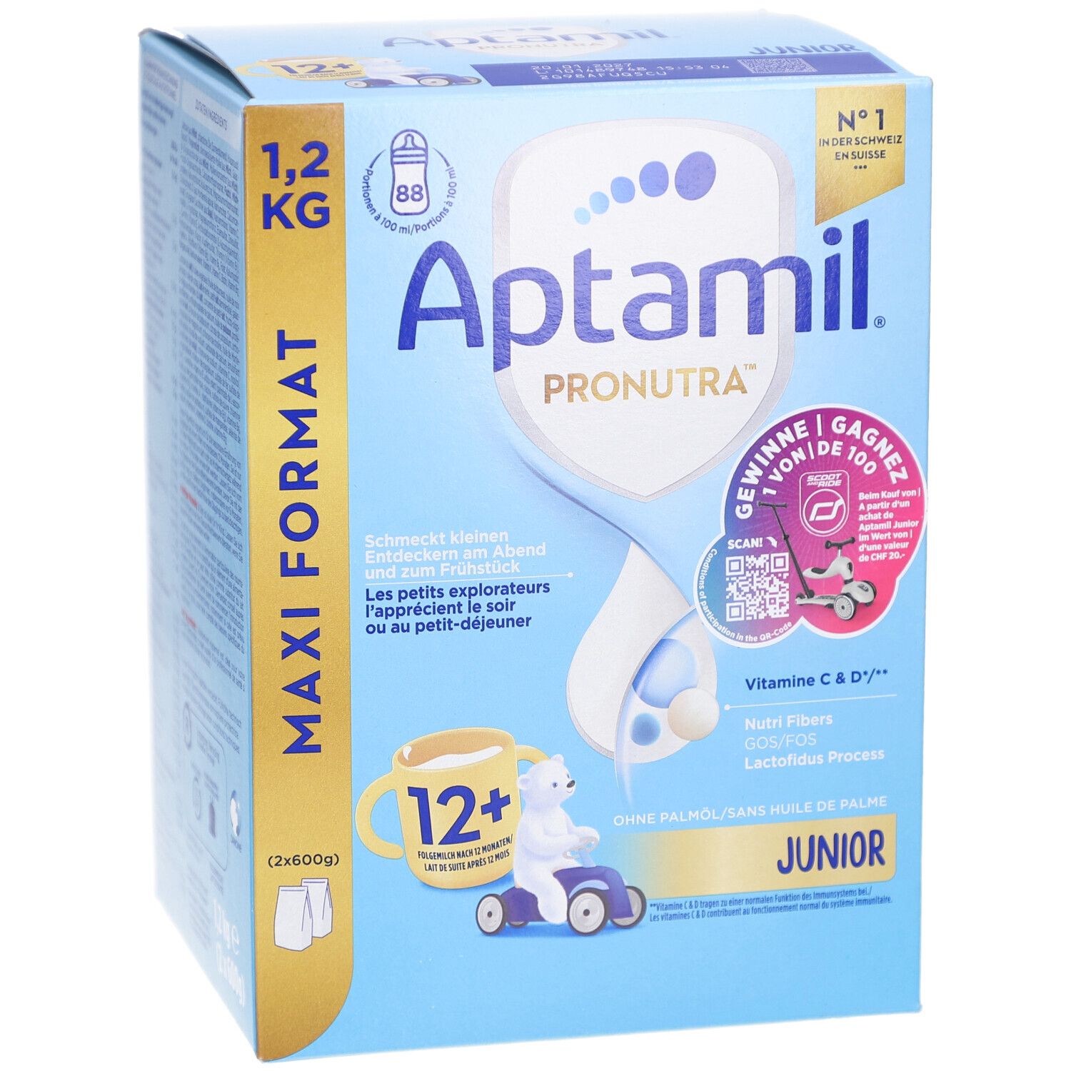 Aptamil PRONUTRA Junior 12+ Folgemilch ab 1 Jahr. Boîte bleue, format Maxi 1,2 kg. Ours et tasse.