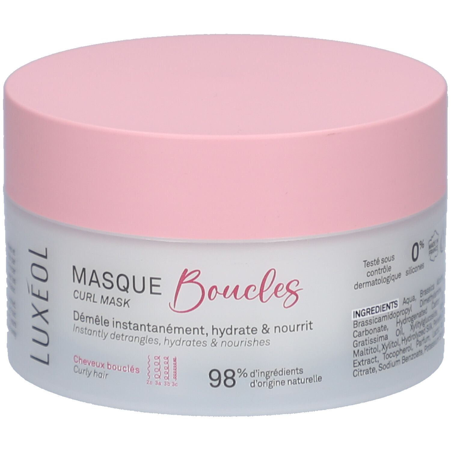 Ronde pot met roze deksel. Opschrift: MASQUE Boucles, CURL MASK. Voor krullend haar. 98% ingrediënten van natuurlijke oorsprong.