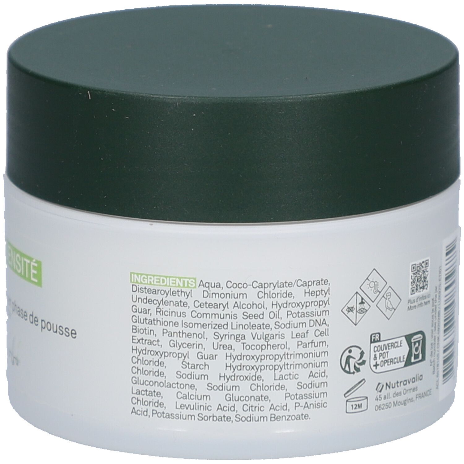 Witte pot met groene deksel. Achterkant met ingrediënten. Tekst: Aqua, Coco-Caprylate/Caprate, etc. QR-code. 12M.