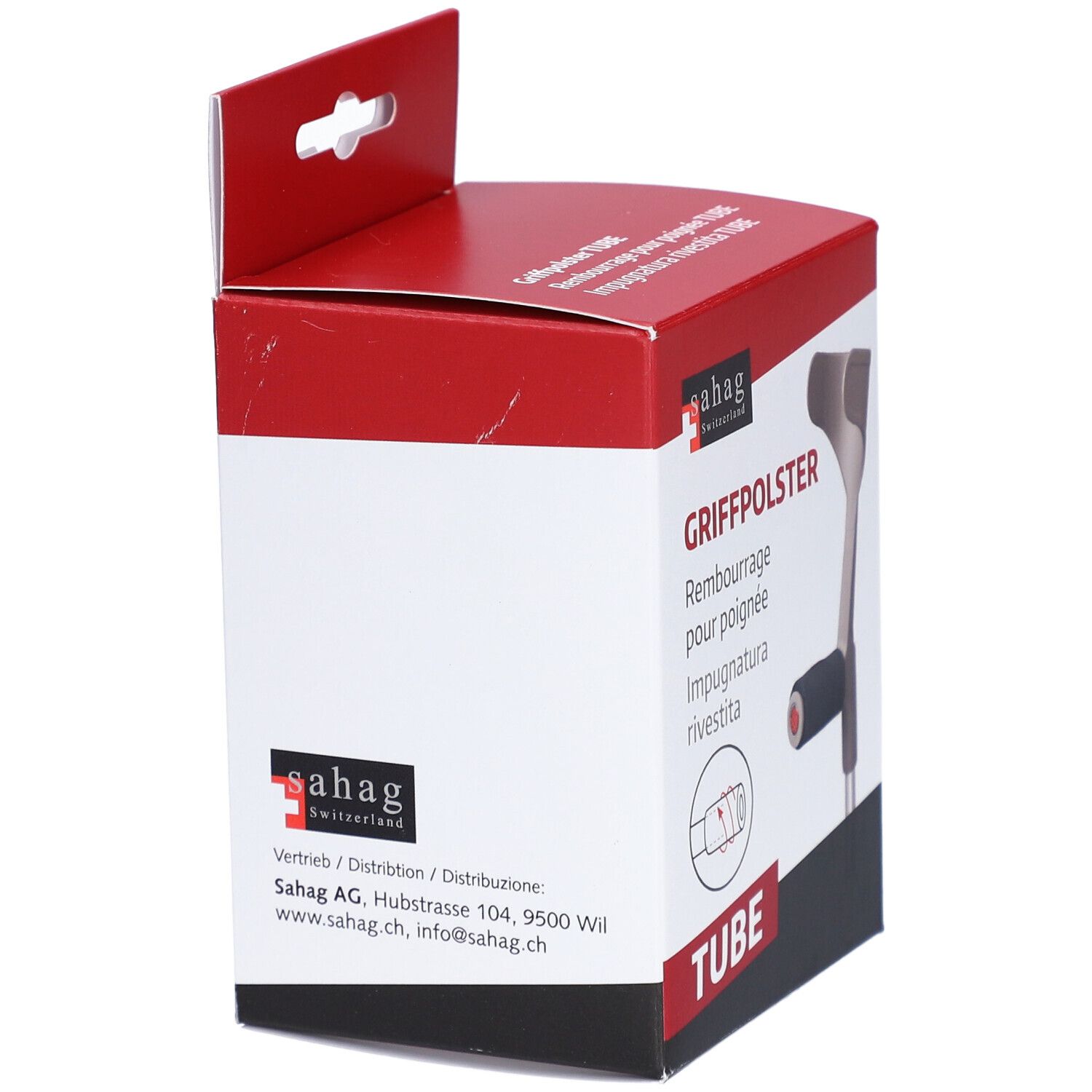 Verpakking met handvatvulling voor krukken. Rode en witte doos met logo en tekst. Merk: sahag.