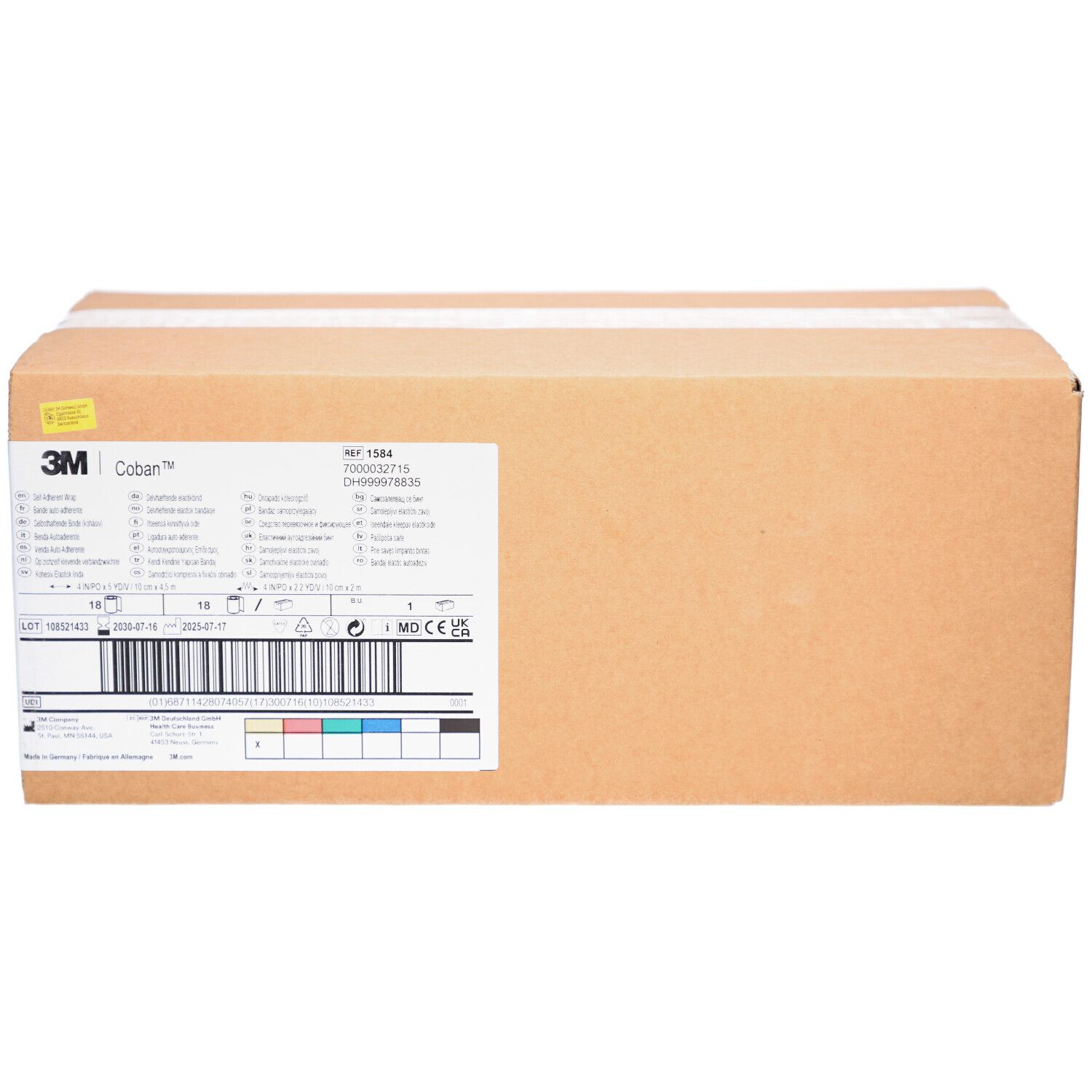 Emballage en carton brun. Impression avec informations produit et logo 3M Coban. Codage couleur et code-barres.