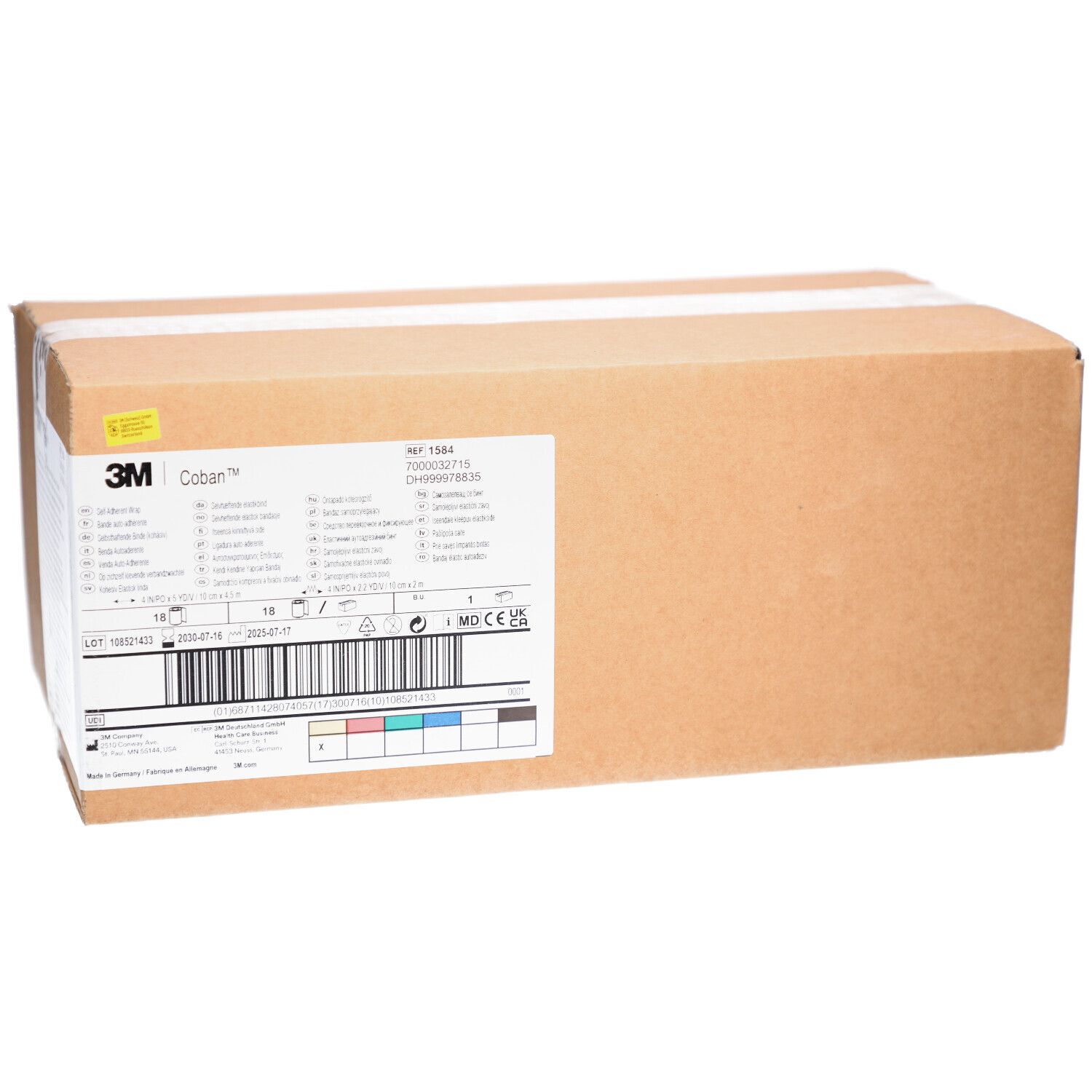 Emballage en carton brun. Impression avec informations produit et logo 3M Coban. Codage couleur et code-barres.