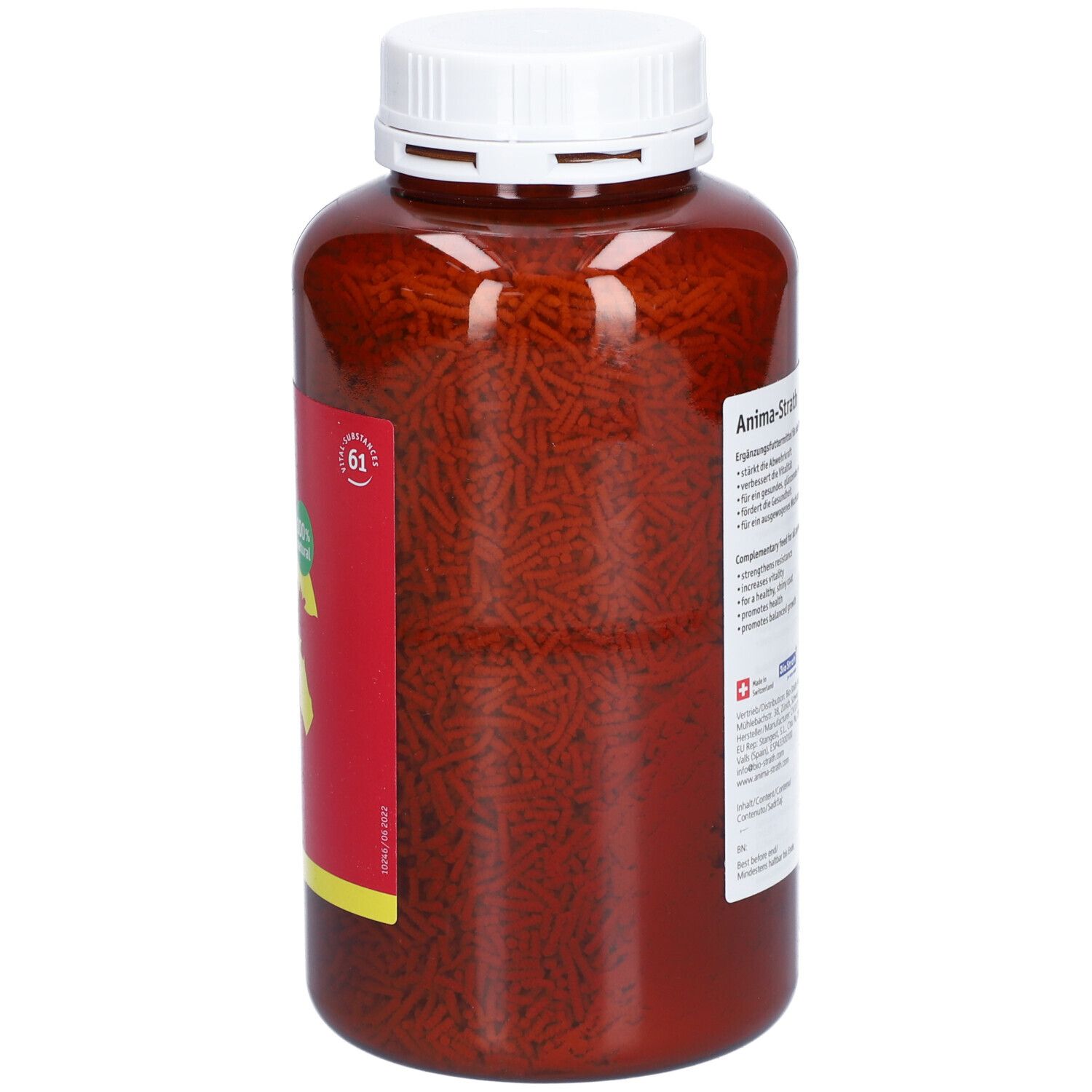 Bruine korrels in een bruine fles met witte dop. Etiket met productinformatie.