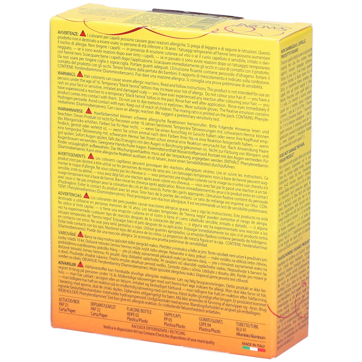 Gele doos, achterkant. Meertalige tekst. Waarschuwingen en ingrediënten. Gemaakt in Italië.