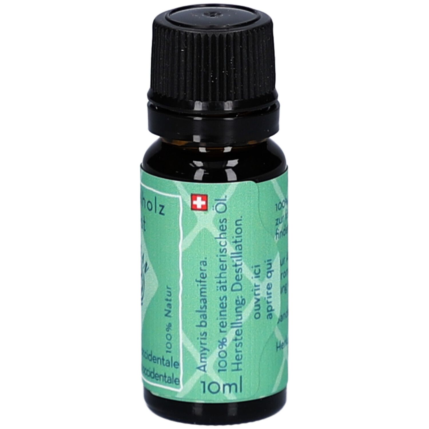 Bruine glazen fles met zwarte dop. Etiket met productnaam, merk, inhoud en volume: 10ml.