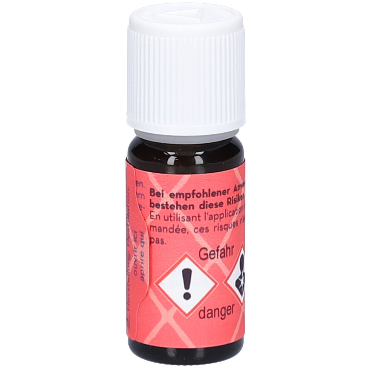 Bruine glazen fles met witte schroefdop. Rood etiket met gevaarsymbolen en tekst: Gevaar, Lavendel Mt. Blanc.