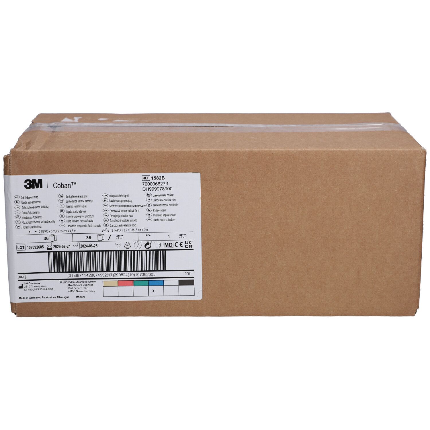 Emballage en carton avec étiquette 3M Coban. Informations sur le produit et code-barres sur l'étiquette.