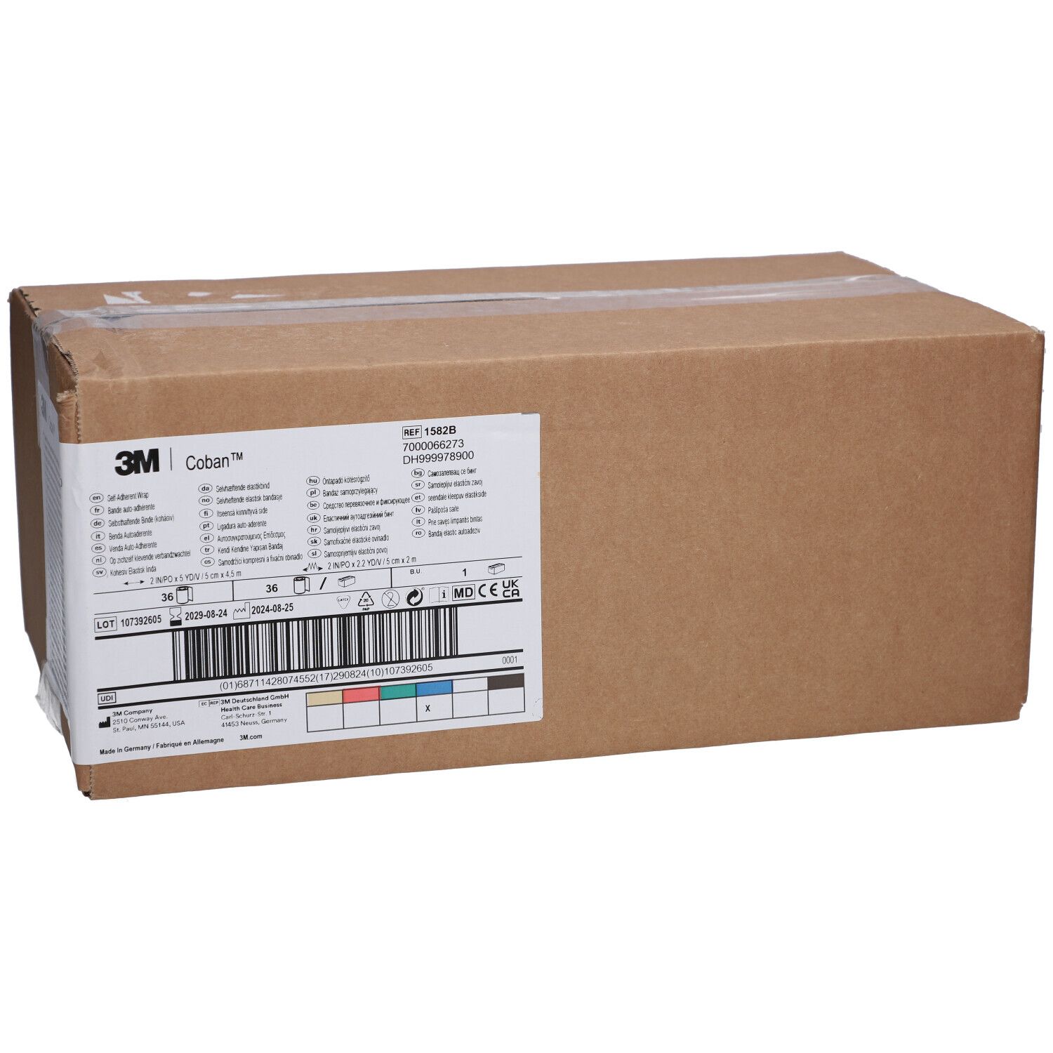 Emballage en carton avec étiquette 3M Coban. Informations sur le produit et code-barres sur l'étiquette.