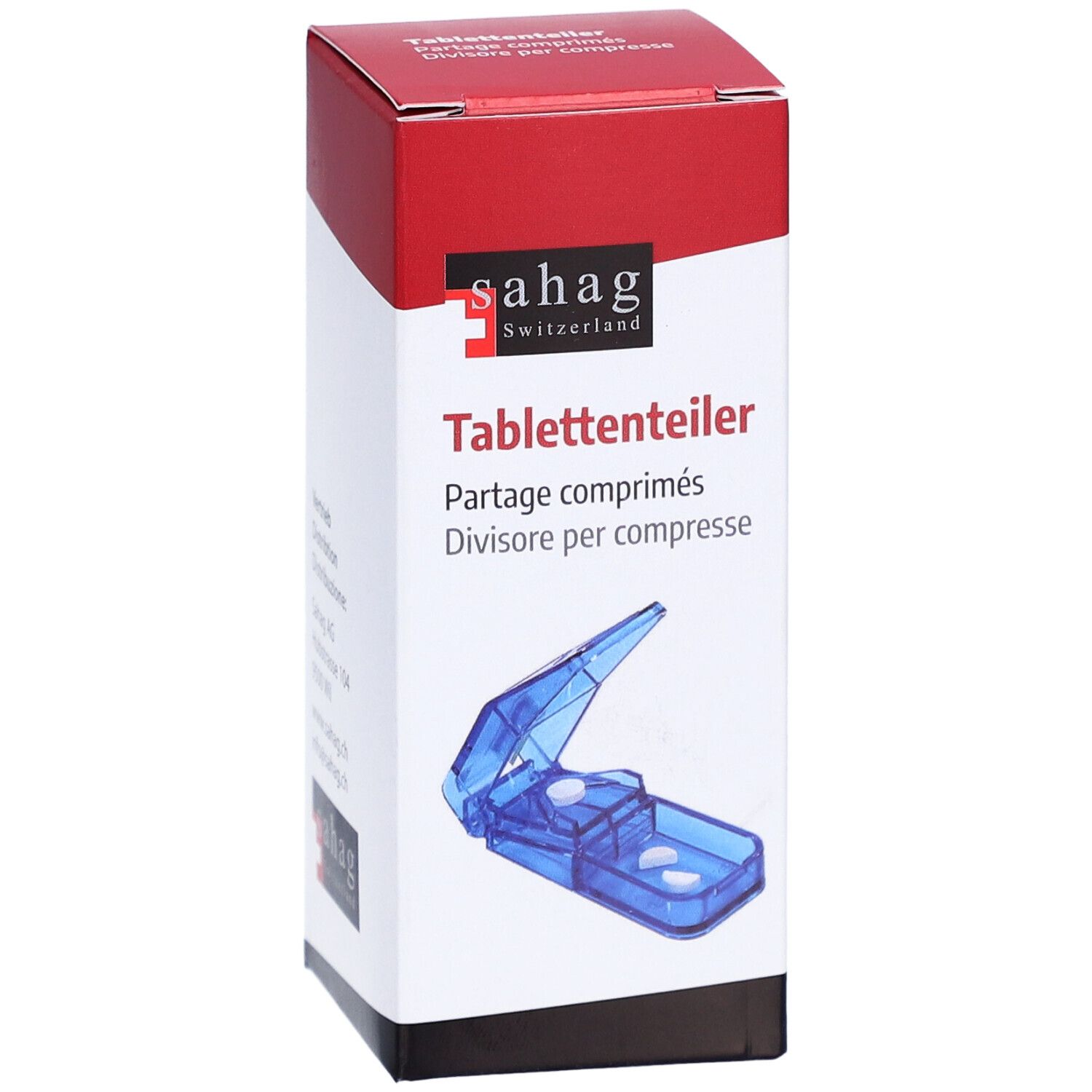 Diviseur de comprimés dans son emballage. Appareil bleu en plastique avec lame. Inscription: sahag Switzerland, diviseur de comprimés.
