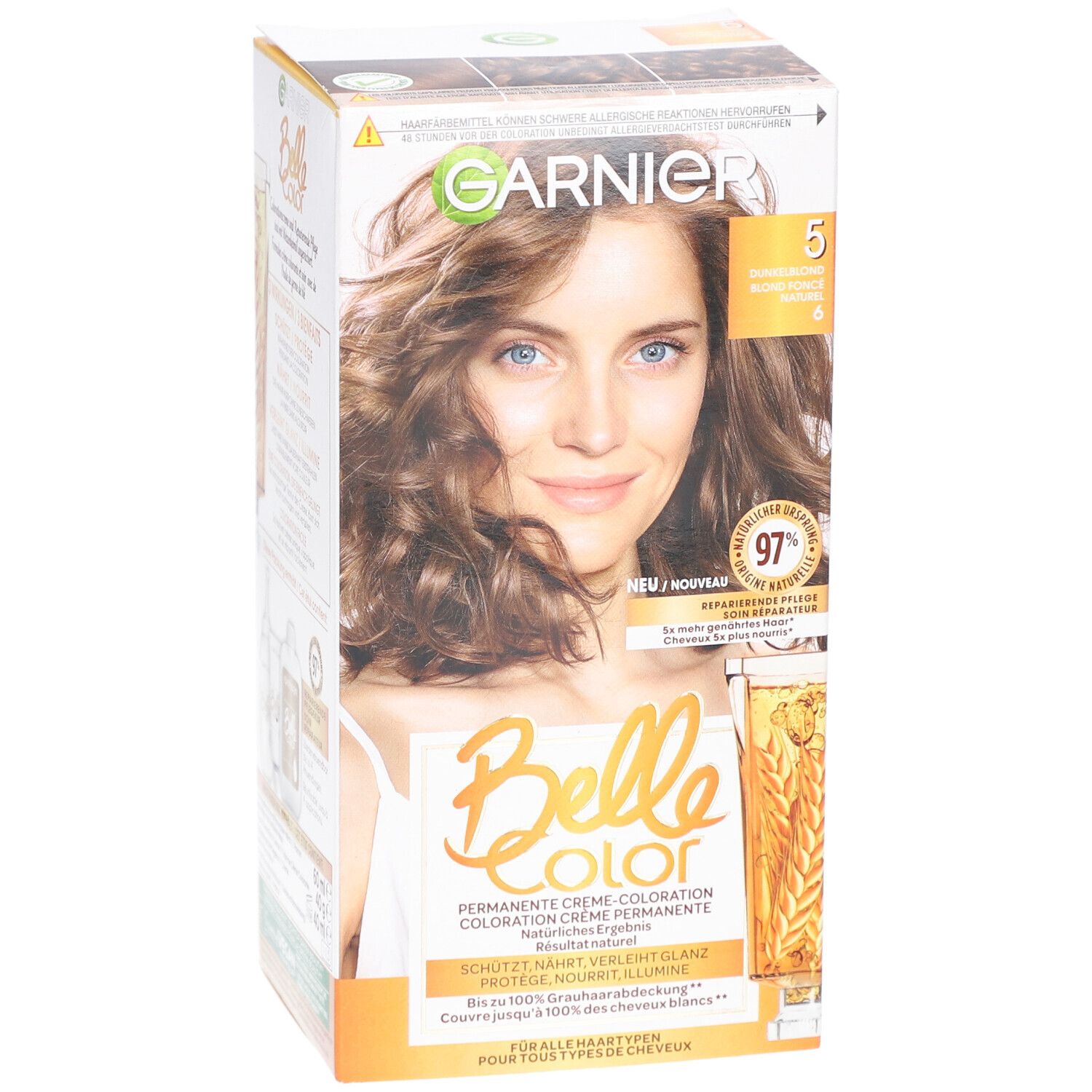 Garnier Belle Color verpakking, voorkant. Vrouw met bruin haar. Opschrift: 5, Donkerblond, 97% gerepareerde punten. Voor alle haartypes.