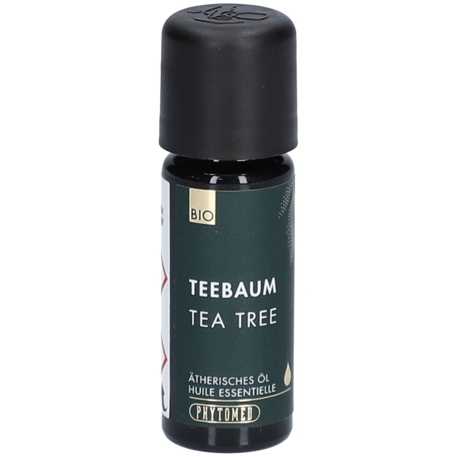 Bruine glazen fles met zwarte dop. Opschrift: Tea Tree, etherische olie, BIO-label. Merk: PHYTOMED.