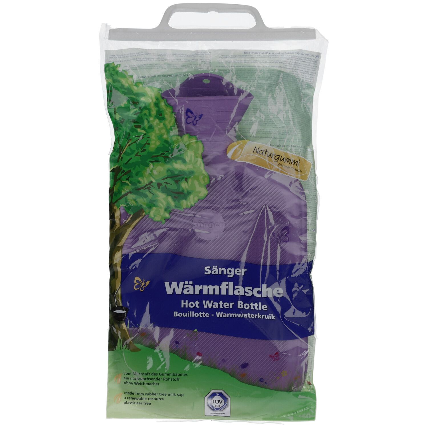 Warmwaterkruik in plastic verpakking. Paarse fles met opschrift "Sänger Wärmflasche". Verpakking met handvat en boommotief.
