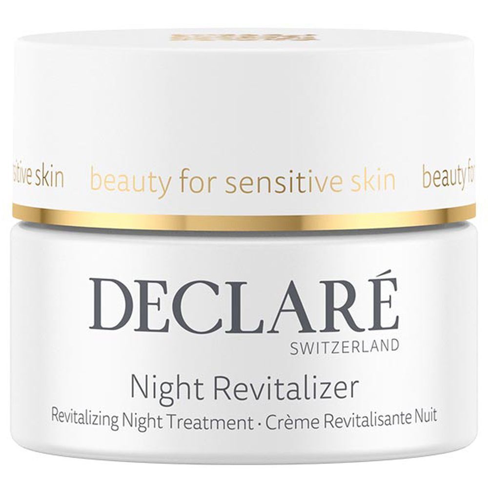 Wit potje met gouden rand. Opschrift: DECLARÉ, Night Revitalizer. Tekst: Revitalizing Night Treatment.