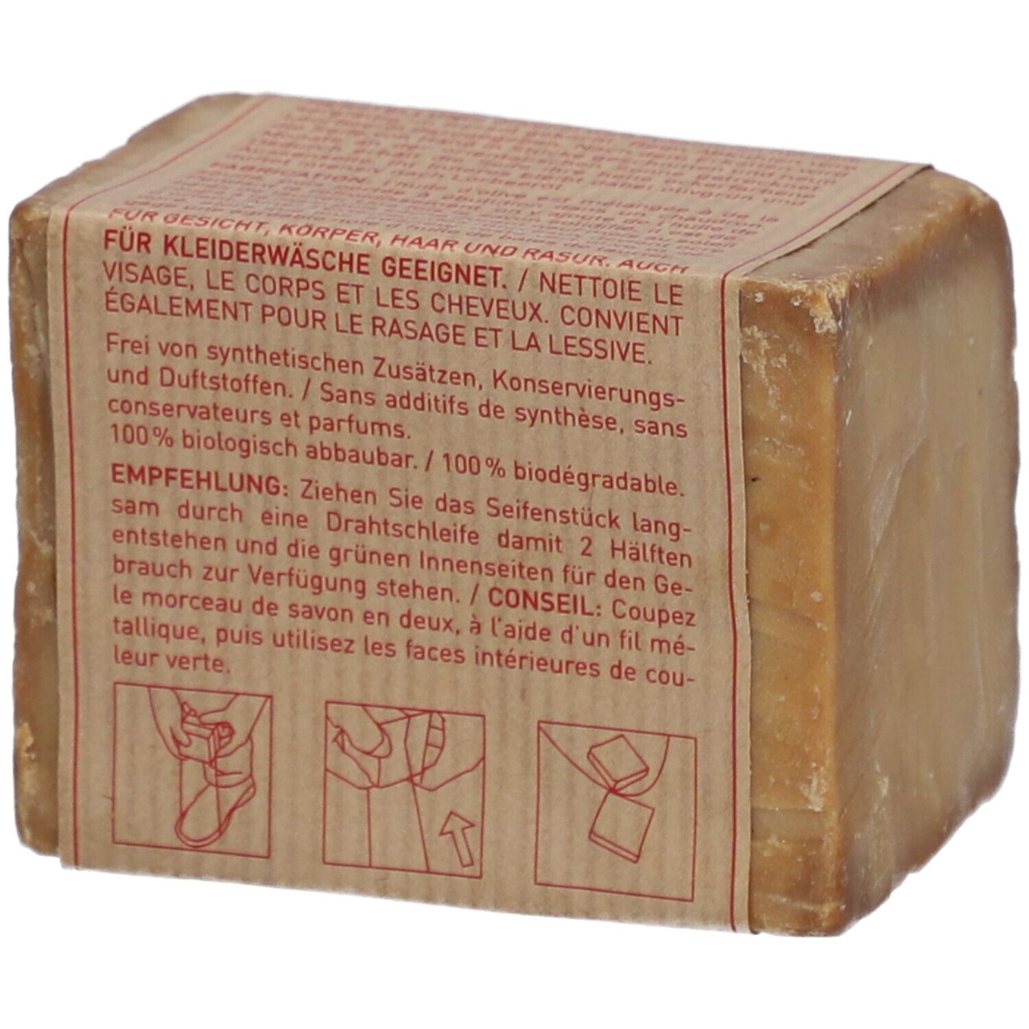 Savon rectangulaire avec emballage en papier. Texte : Convient au lavage des vêtements. 100% biodégradable. Instructions de partage.