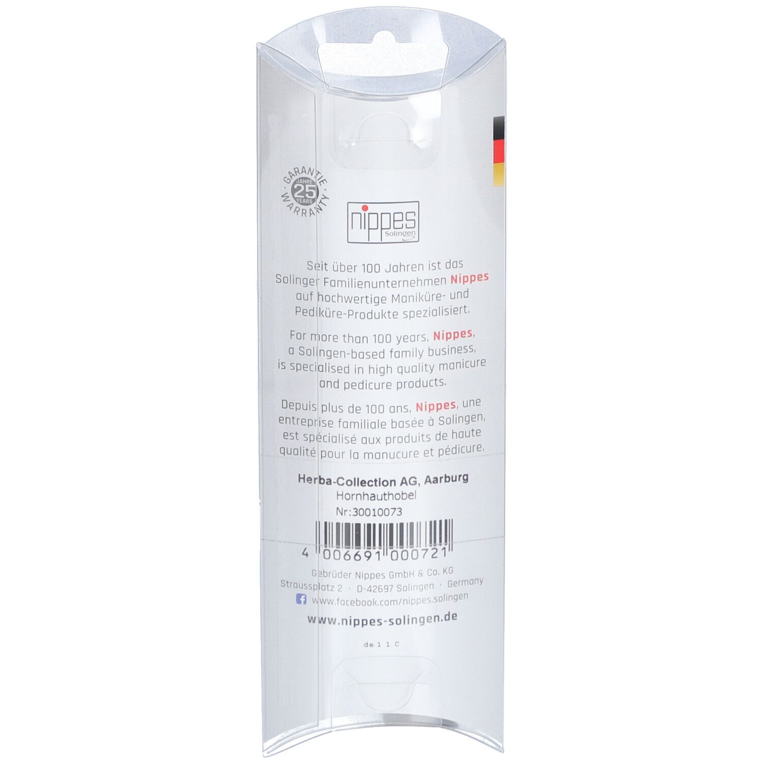 Achterkant van de verpakking. Tekst: NIPPES, familiebedrijf. Garantie logo. Barcode en contactgegevens. Made in Germany.
